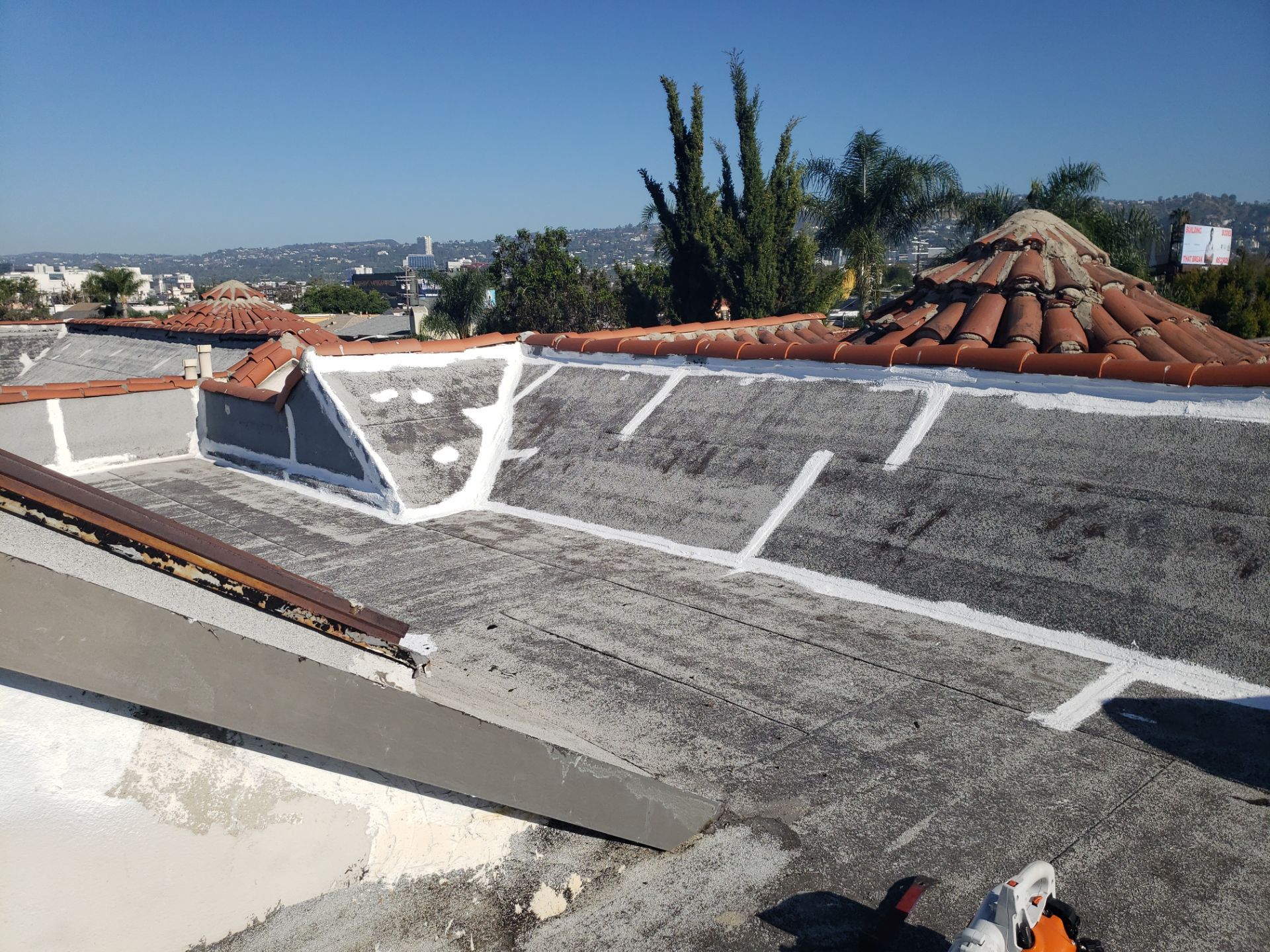 Commercial Roofing Installation using Silicone Coating by Hull Brothers Roofing
