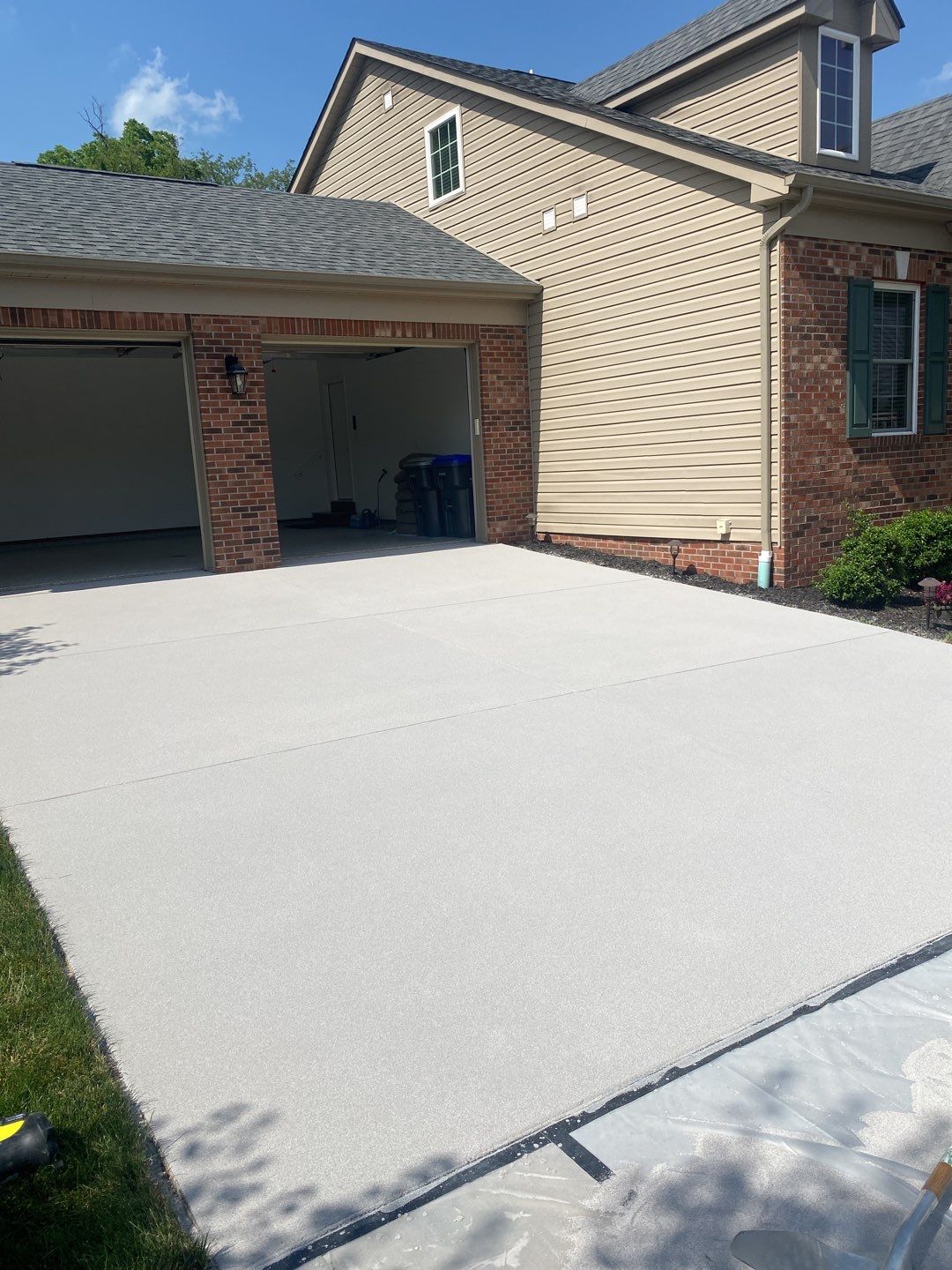 Driveway + Garage Project in Cranberry Township by Floors in a Day, Inc