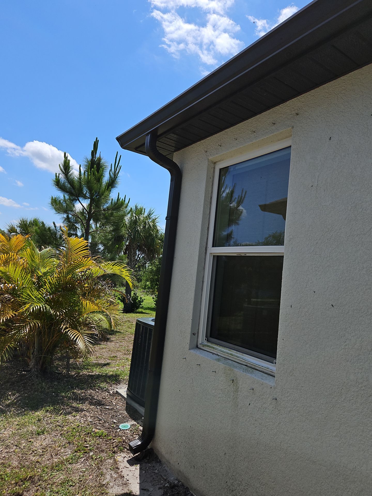 K-Style Seamless Gutter Installation using bronze gutters in Sarasota FL by Gutter Professors