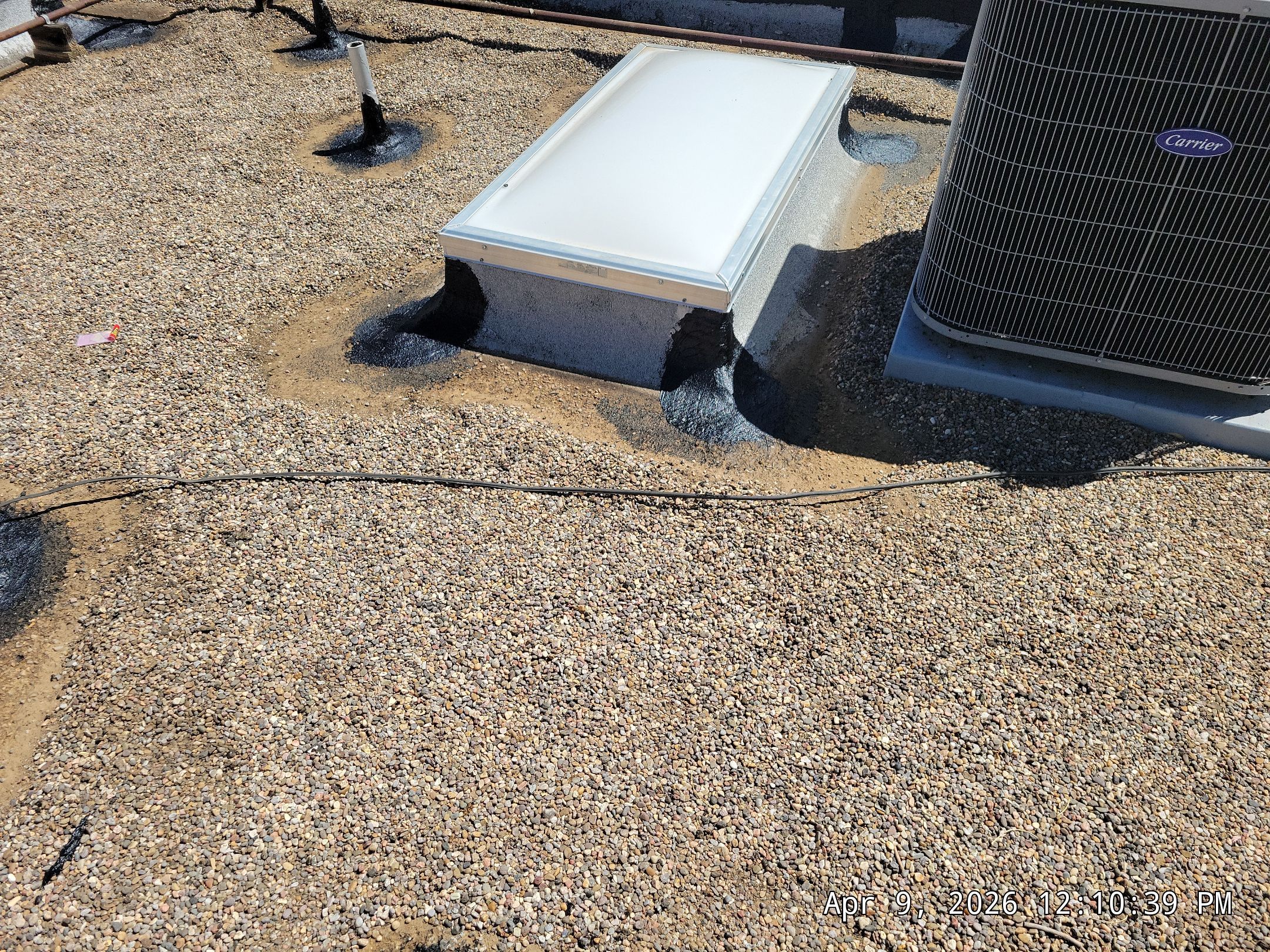 Tar and Gravel Roof Maintenance and Skylight Sealing in Rio Rancho by Doyle Roof Masters Inc