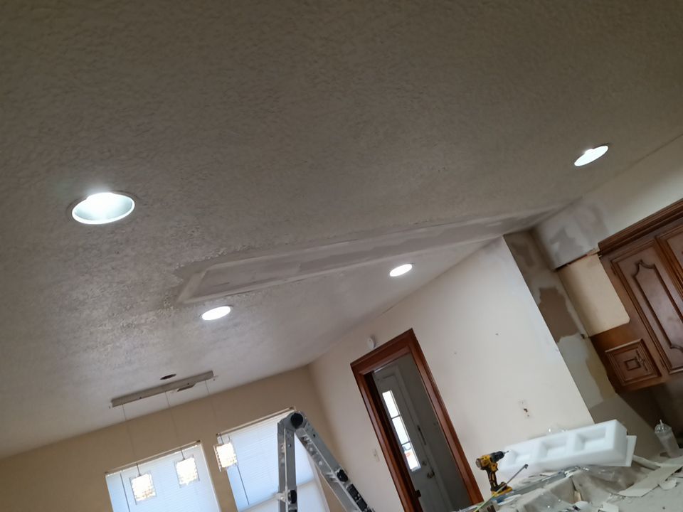 Interior and exterior painting project by Roof Concepts Construction