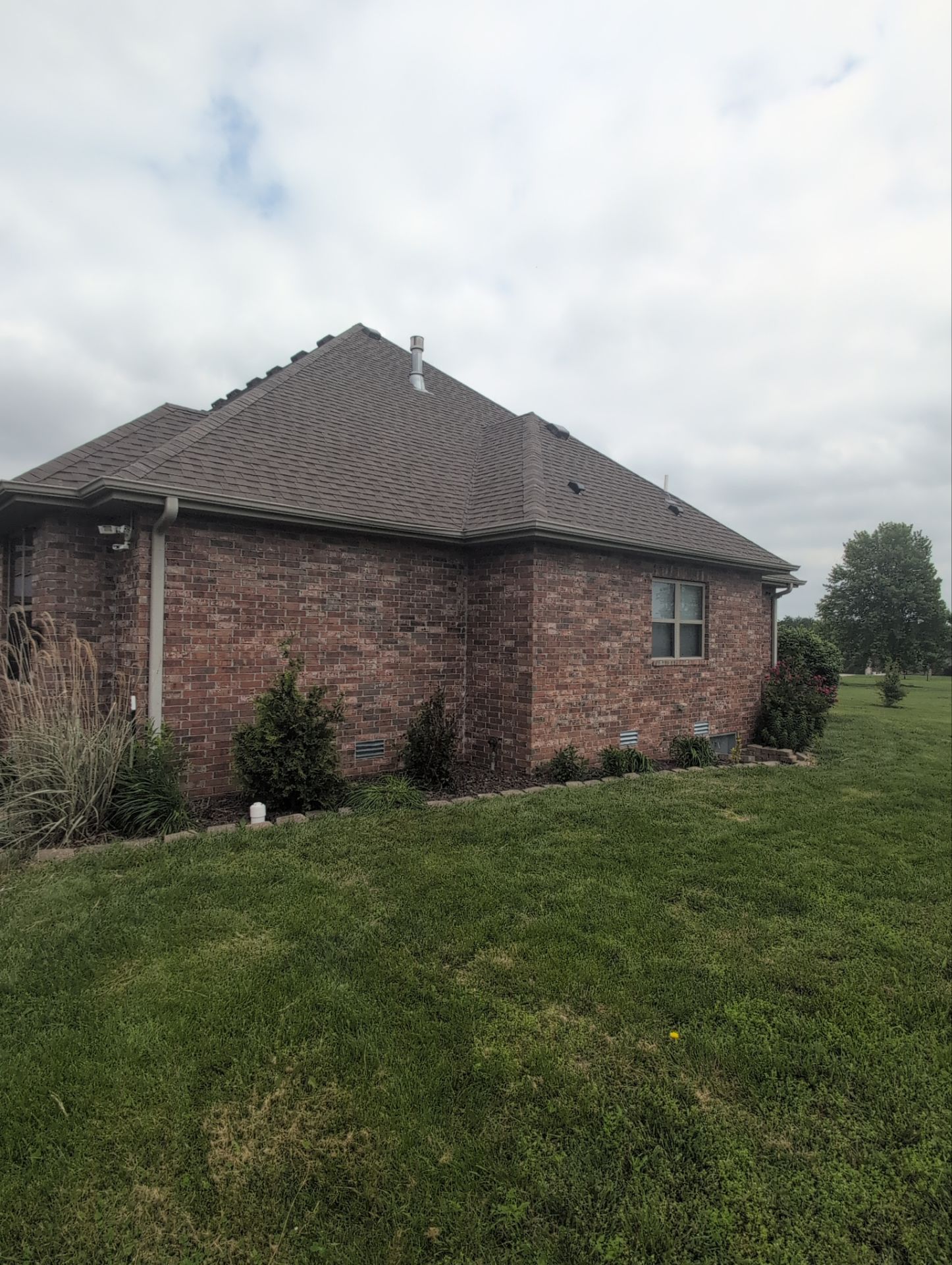 Roof Replacement & Seamless Gutters in Ozark by Table Rock Design + Build