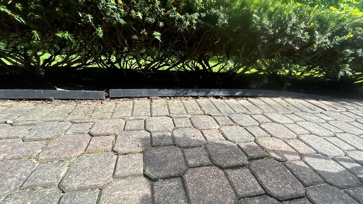Brick paver repair, clean and seal by Northern Power Washing LLC.