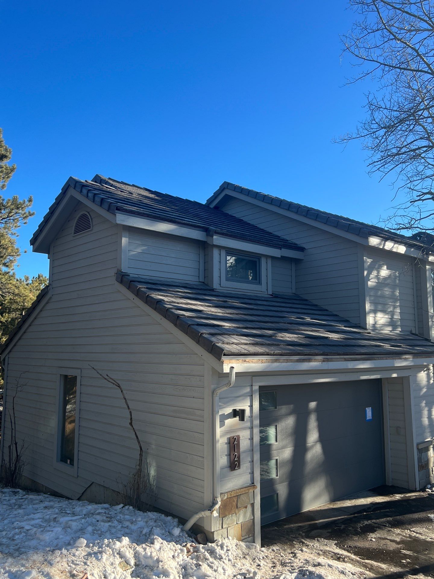 Residential Roofing Installation using Concrete Tile by Blue Peaks Roofing LLC 