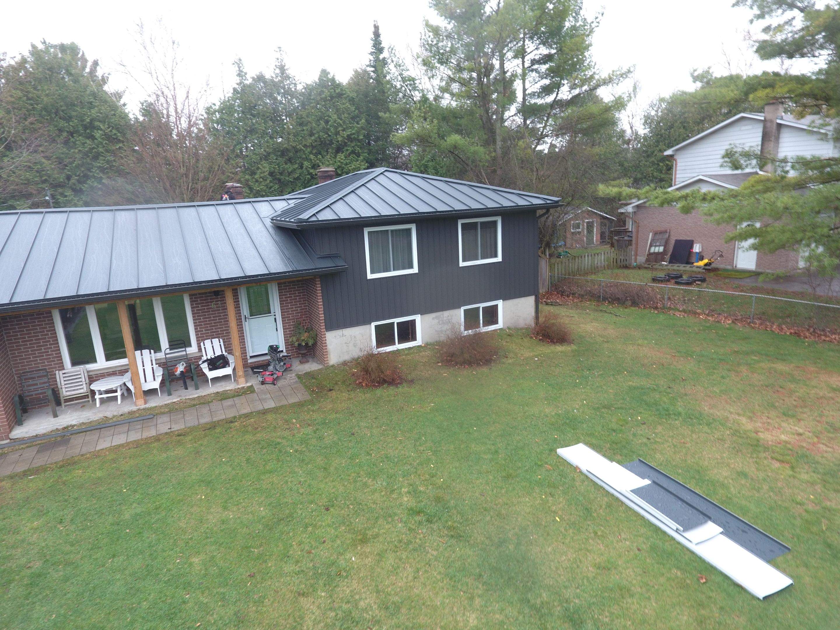 Residential Roofing Installation using 24 Ga Standing Seam Metal by Jay Carter Roofing & Sheet Metal