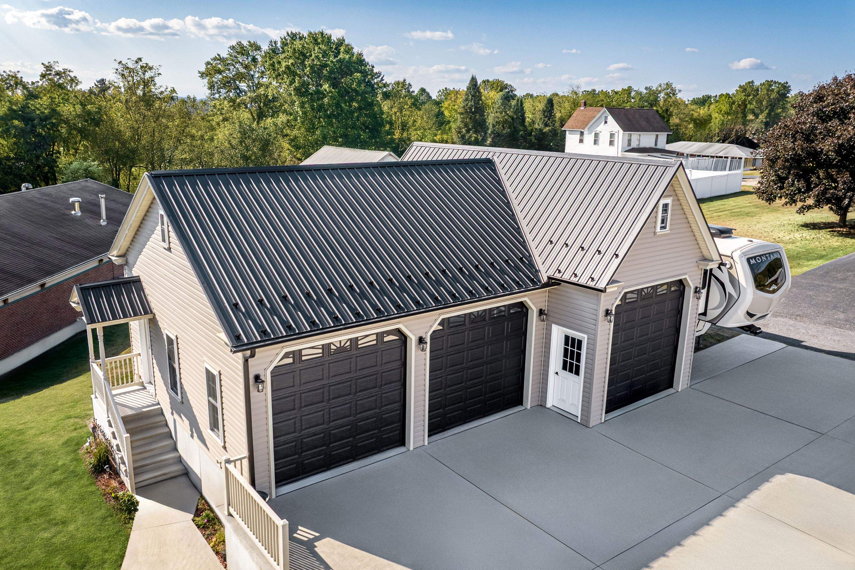 Textured Black Meal Roof by Esh Builders