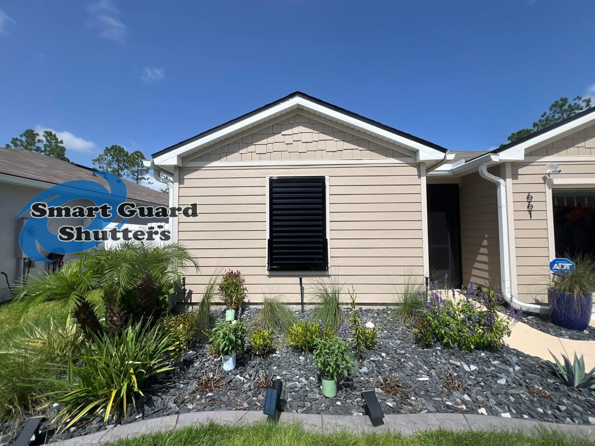 Impact Bahama Shutter in Jet Black by Smart Guard Shutters