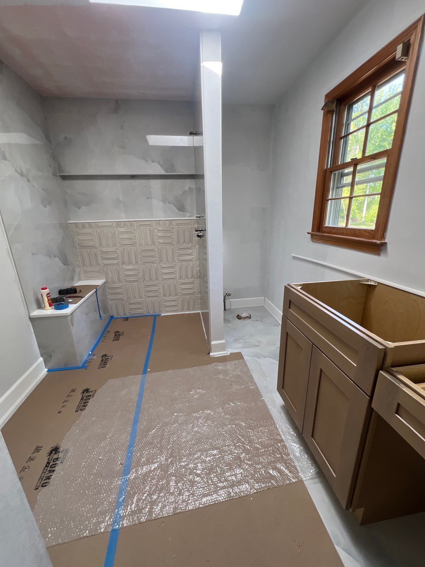 Modern Bathroom Remodeling Featuring Marble Tiles and Custom Cabinetry in Smyrna by Swift Home Renovations