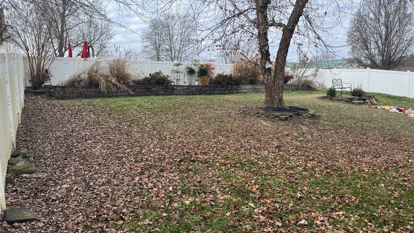 Leaf clean up using Leaf vaccum  by GrassBusters, Inc.