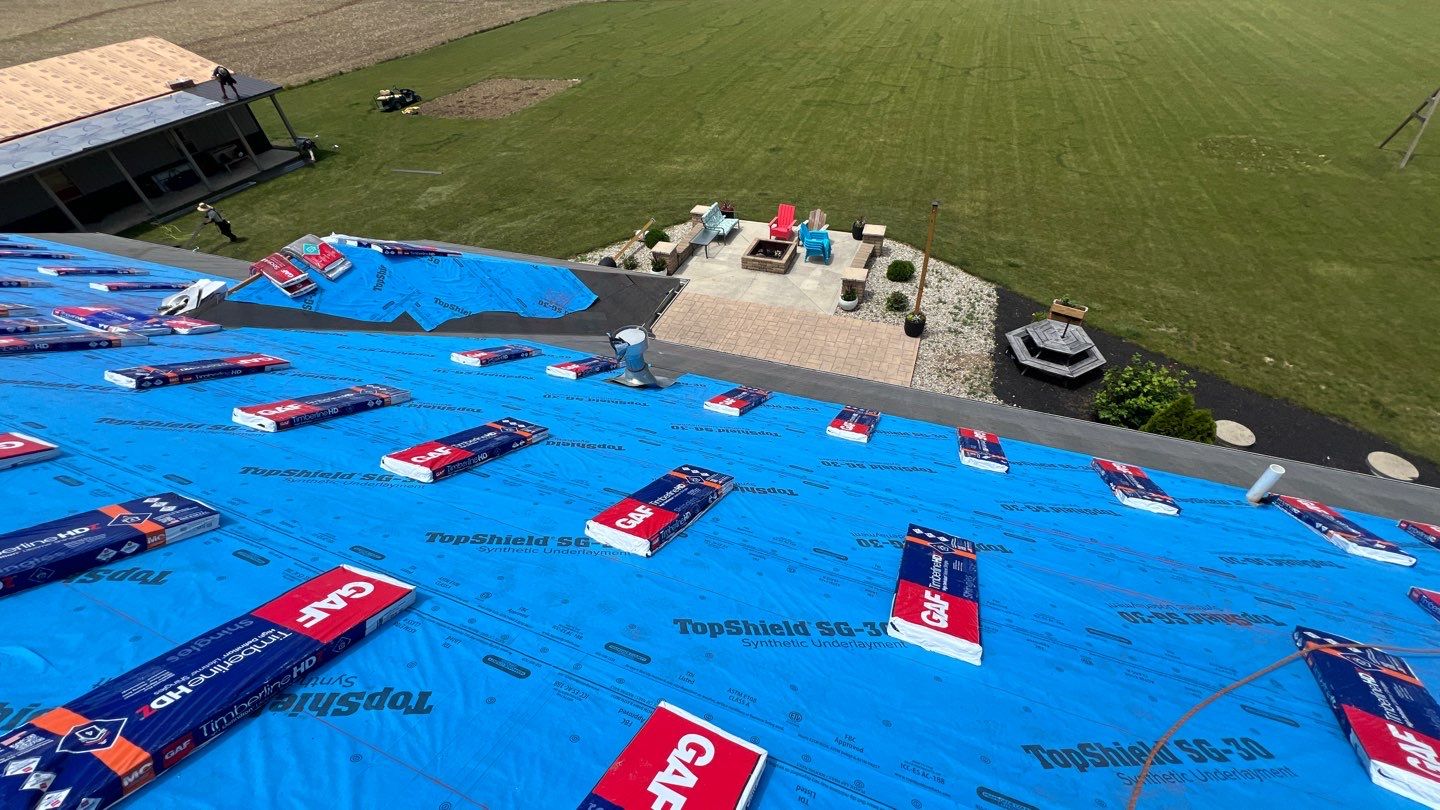 Asphalt roof replacement/ Ag panel roof replacement/ Vinyl siding replacement by Nitro Roofing and Construction