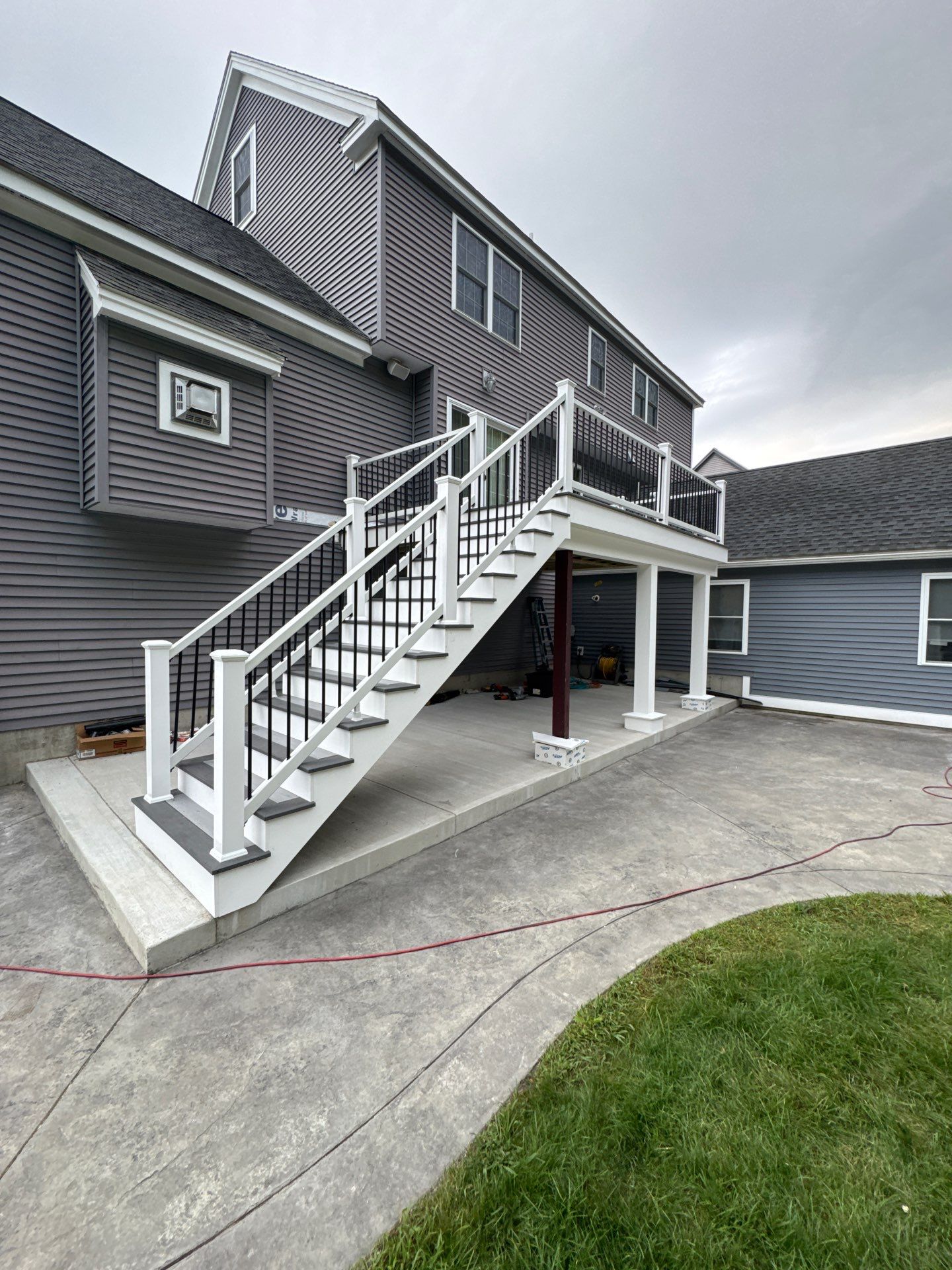 Roof, Trim, Deck, and Gutter Restoration by Mighty Dog Roofing of Greater Middlesex County