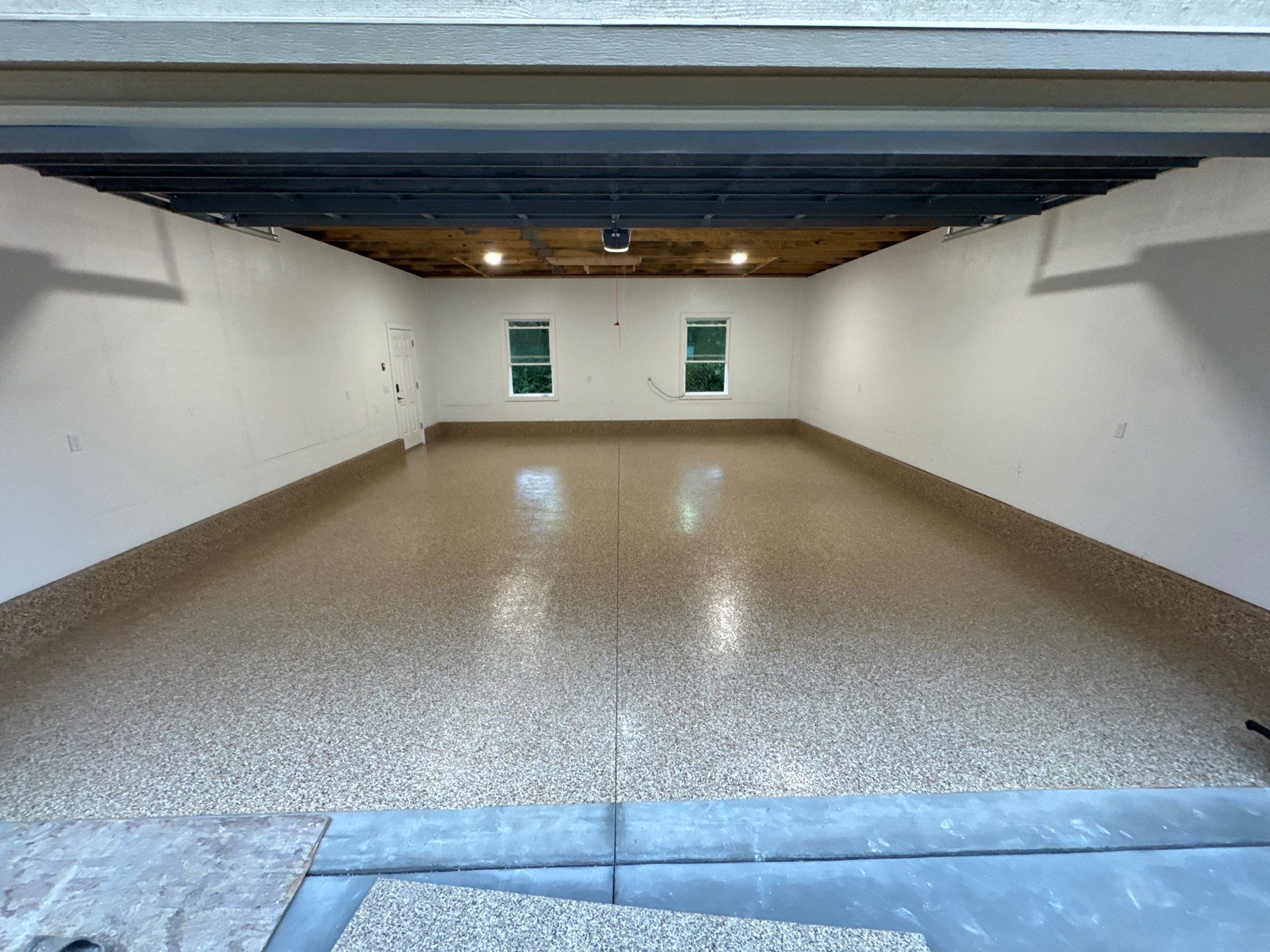 Garage in Gainesville, FL in Sandstone by Cross Creek Concrete Coatings