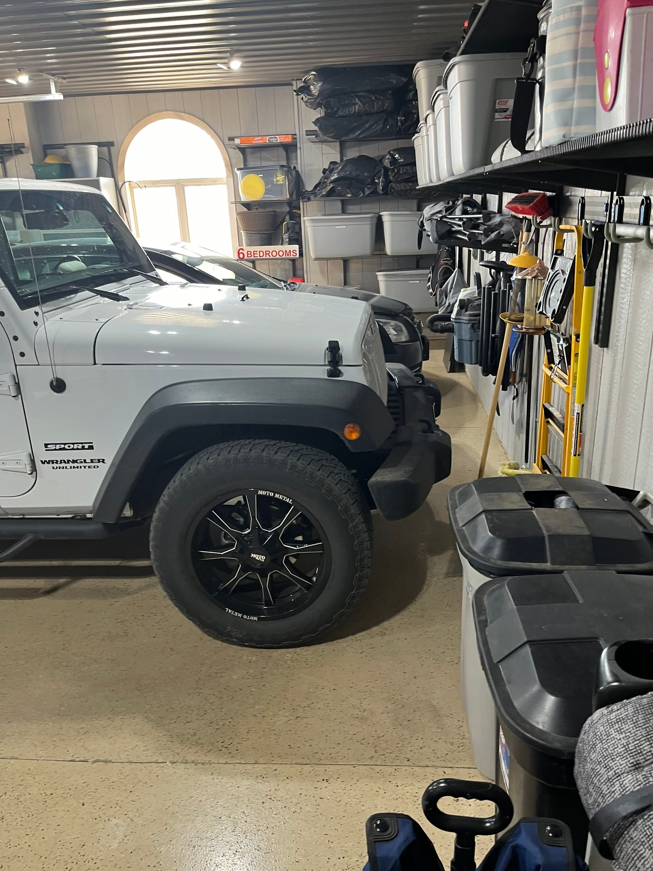 High-Gloss Grey Epoxy Floor Coating for Inwood Garage by Select Painting, Coatings & Garage Cabinets