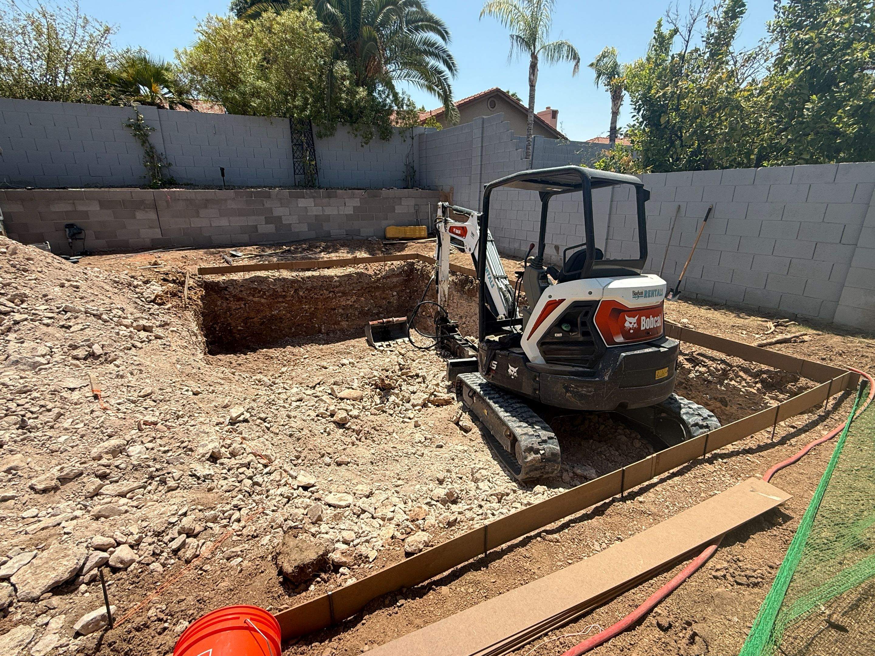 Pool build with baja step and pebble finish by Modern Pools
