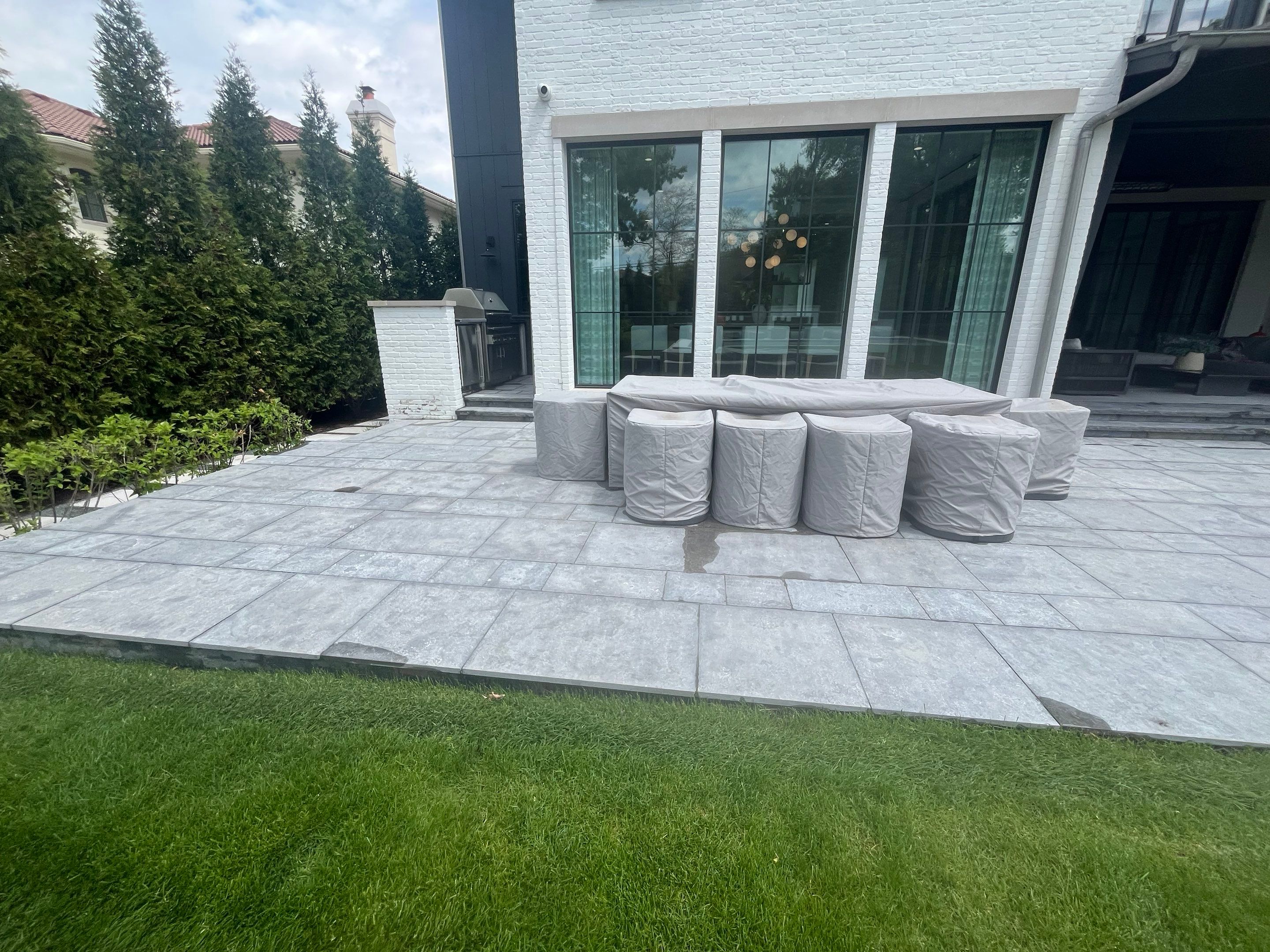 Exterior Stone and Garage Pressure Washing by Northern Power Washing LLC.