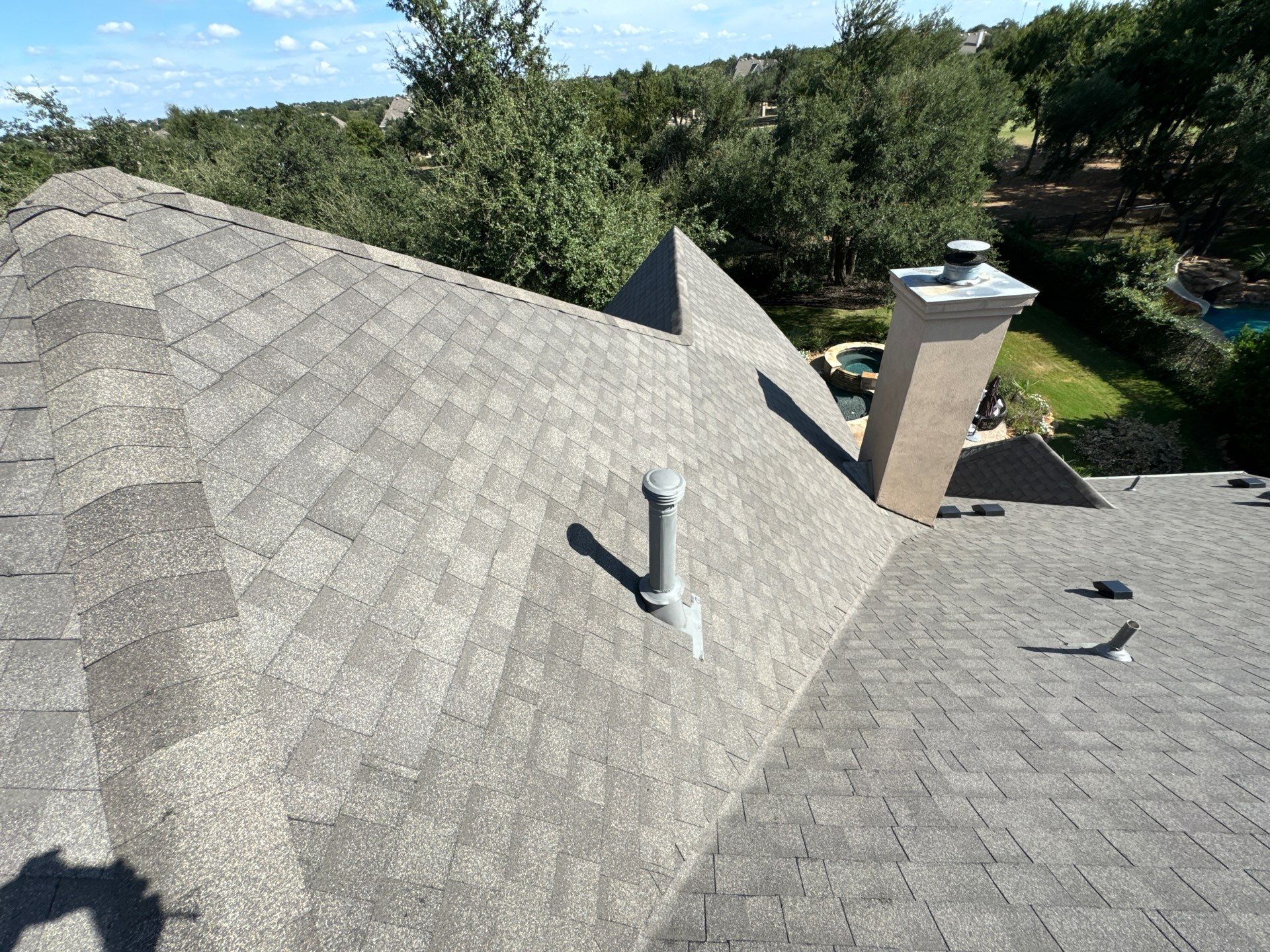 Residential Roofing Installation using IKO, Cambridge in Weathered Wood by Oakwood Roofing and Construction, LLC