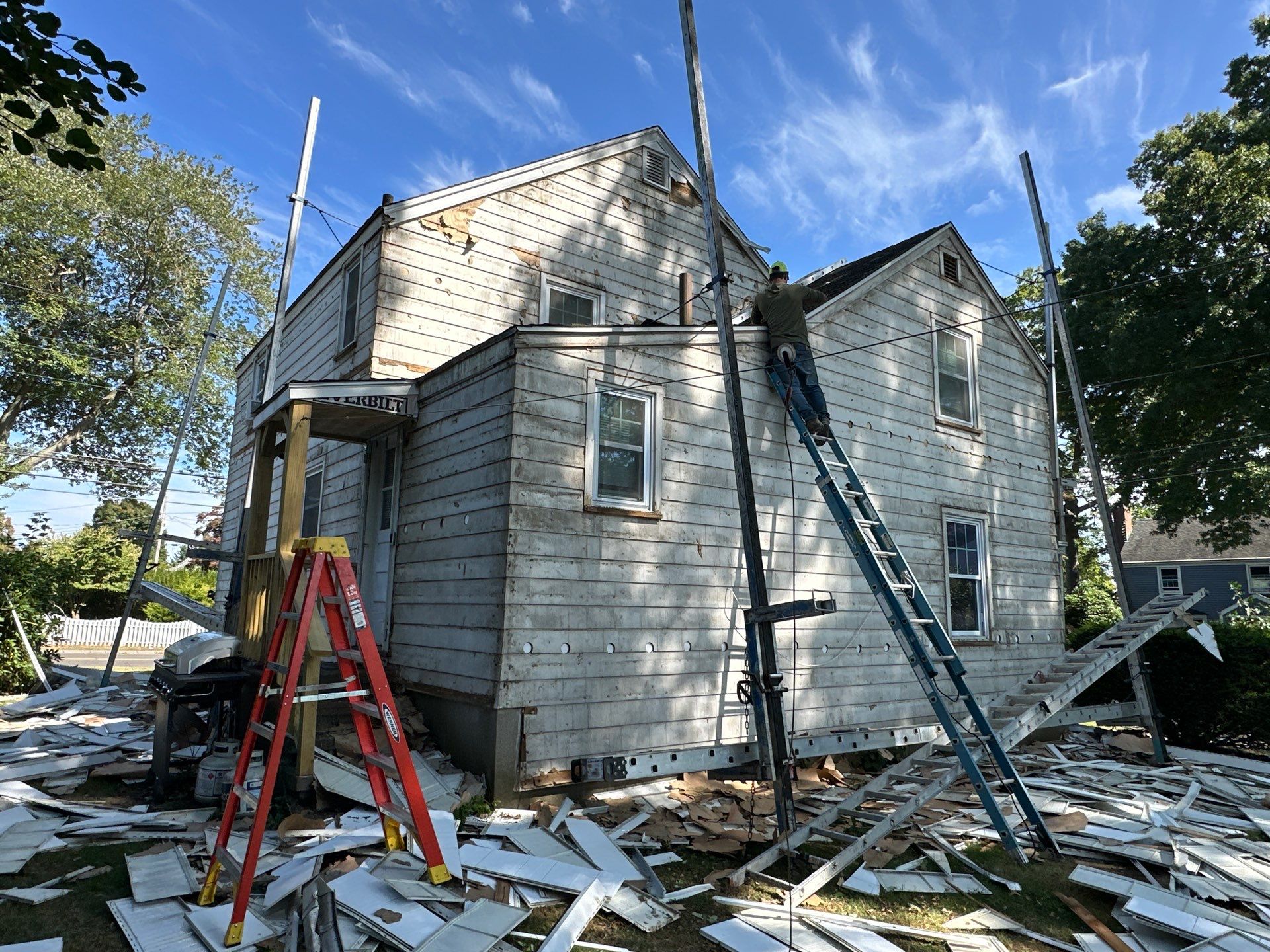 Siding Installation using CertainTeed Monogram Vinyl Siding - D4 - Forest by A Plus Exterior