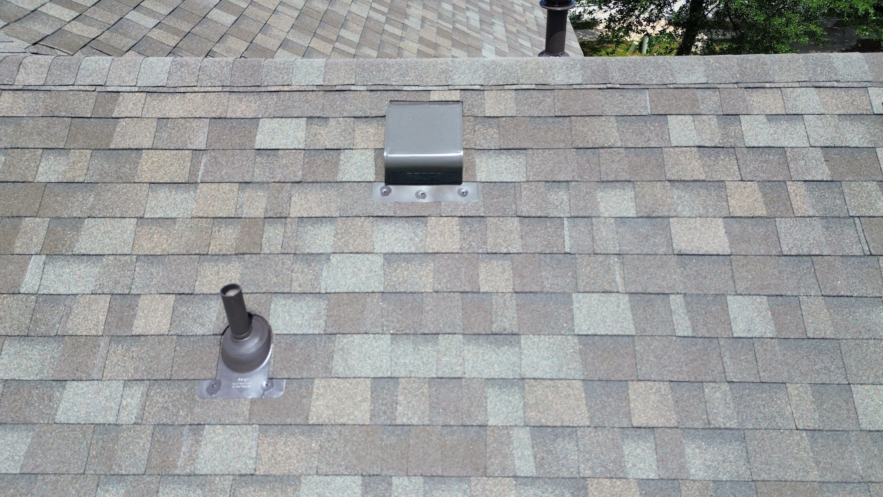 Roof Replacement & Chimney Cricket Upgrade in Cedar Park, TX by Kstylez Roofing & Construction