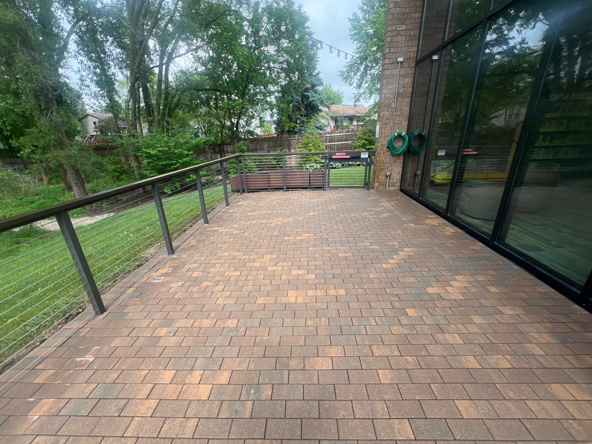 Brick paver repair, cleaning, sealing and poly sanding by Northern Power Washing LLC.