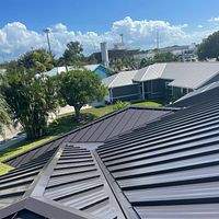 24ga 1.5" Mechanical Seam Dark Bronze by Total Roofing System The Metal Roof Experts