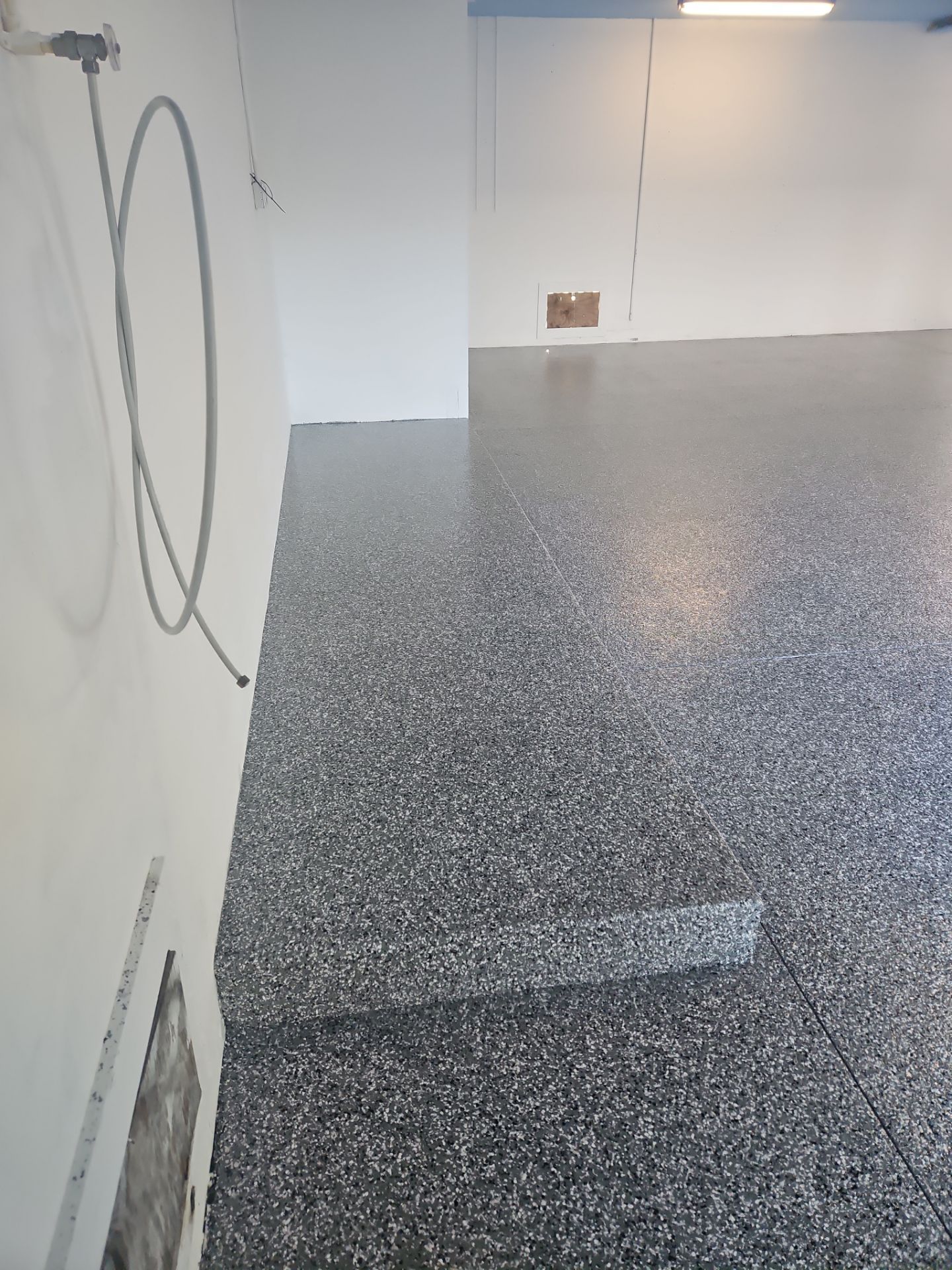 Longboat Key Garage Transformation! by Performance Floors & Coating