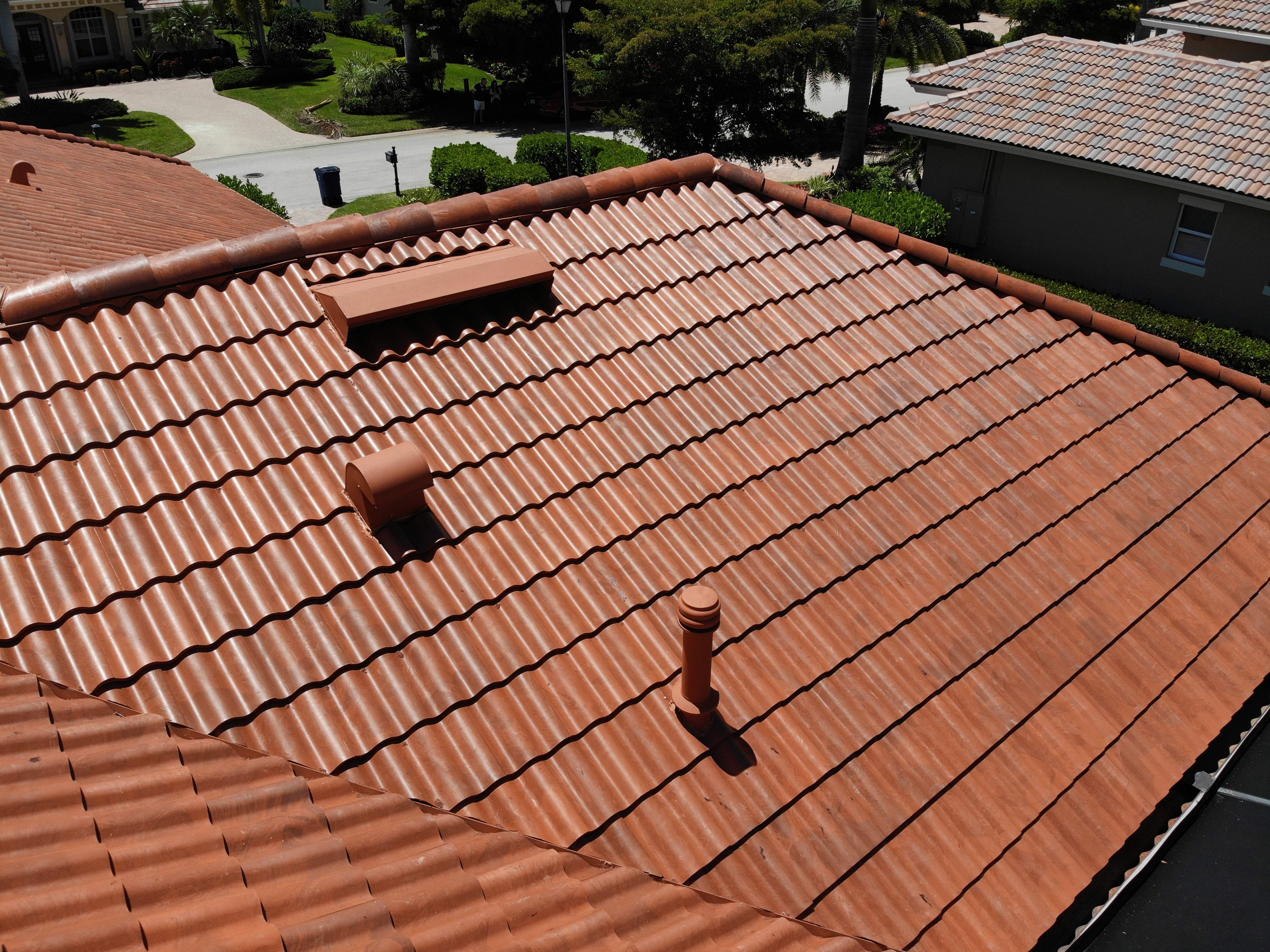 Residential Roofing Installation using Composite Spanish Tile by International Roofing