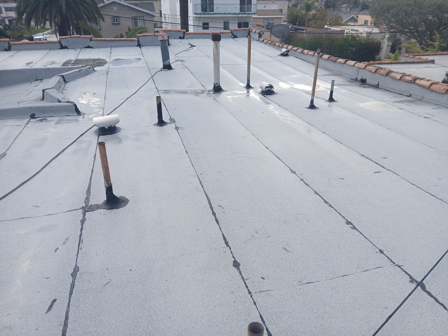 Silicone Membrane Installation using American Standard Coatings Silicone-S by Hull Brothers Roofing