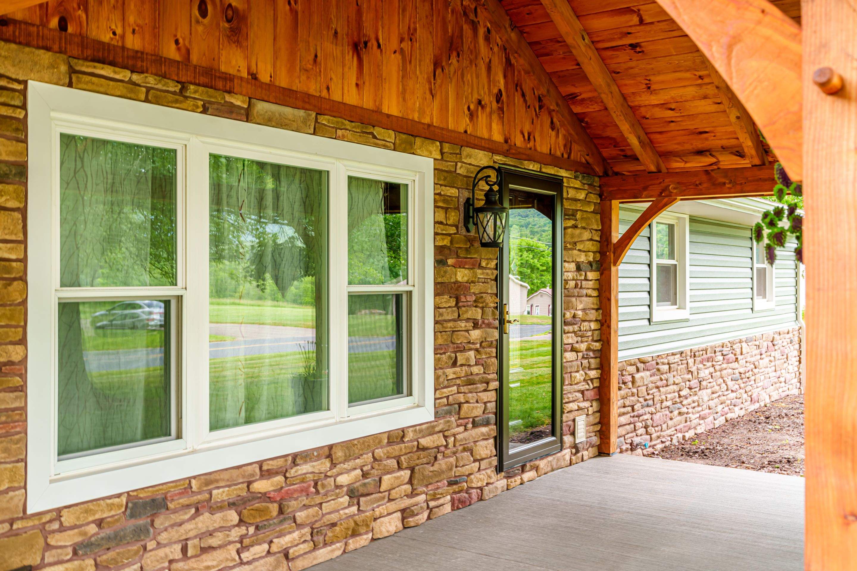 Shingle Roof- new siding- entry door by Esh Builders