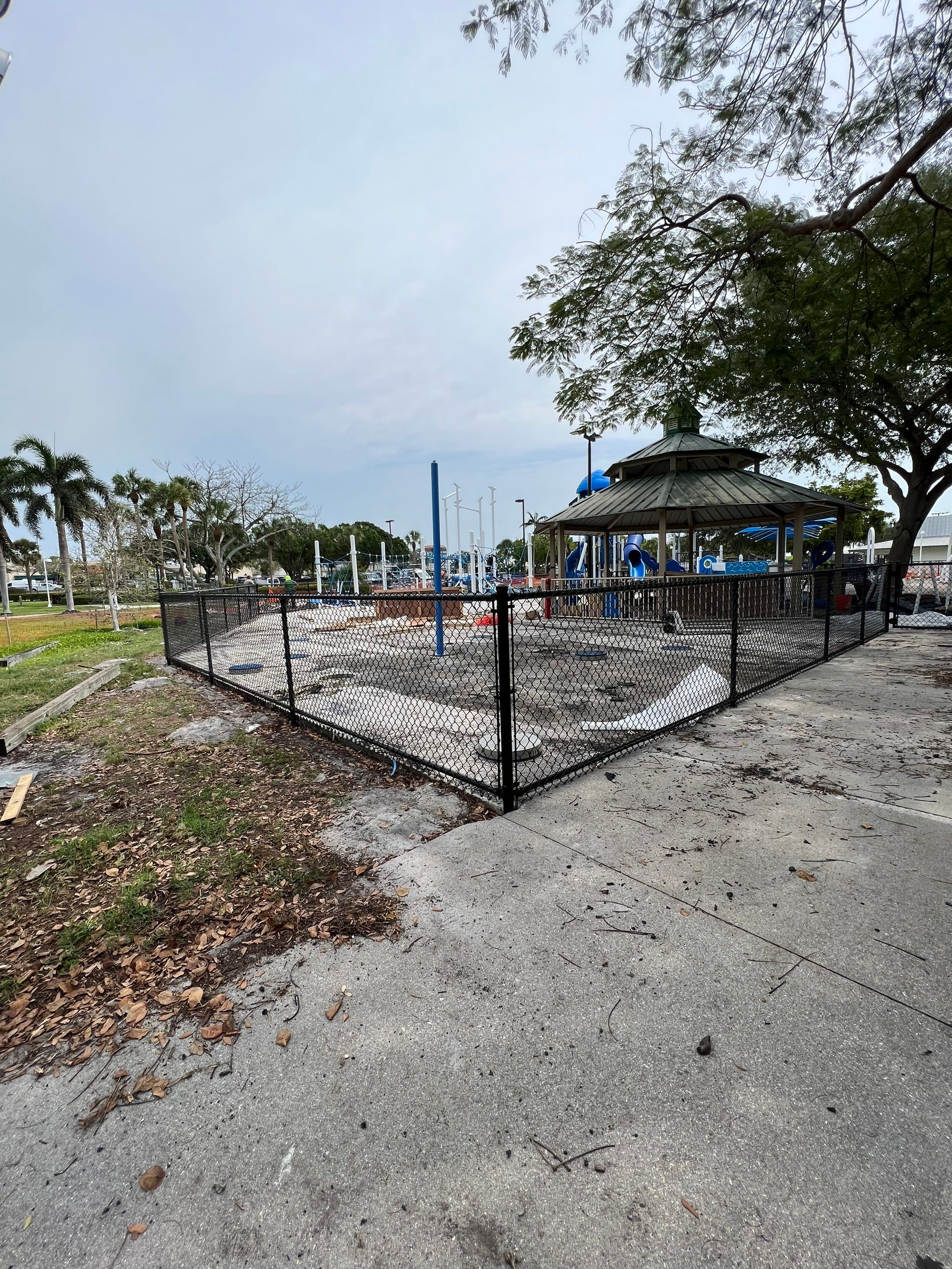Vinyl Coated Chain-link fence for the City of Naples around Fleischmann Park Playground.  by Asap fence and gates, LLC