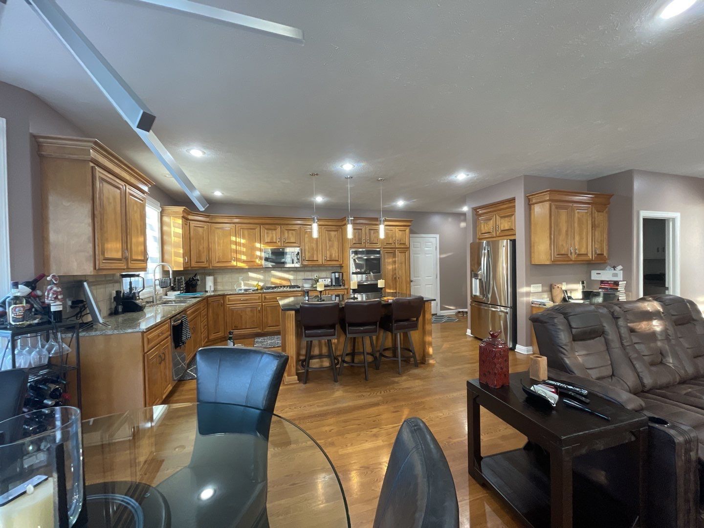 Painting Hardwood using Sherwin Williams paint by Lightning Exteriors