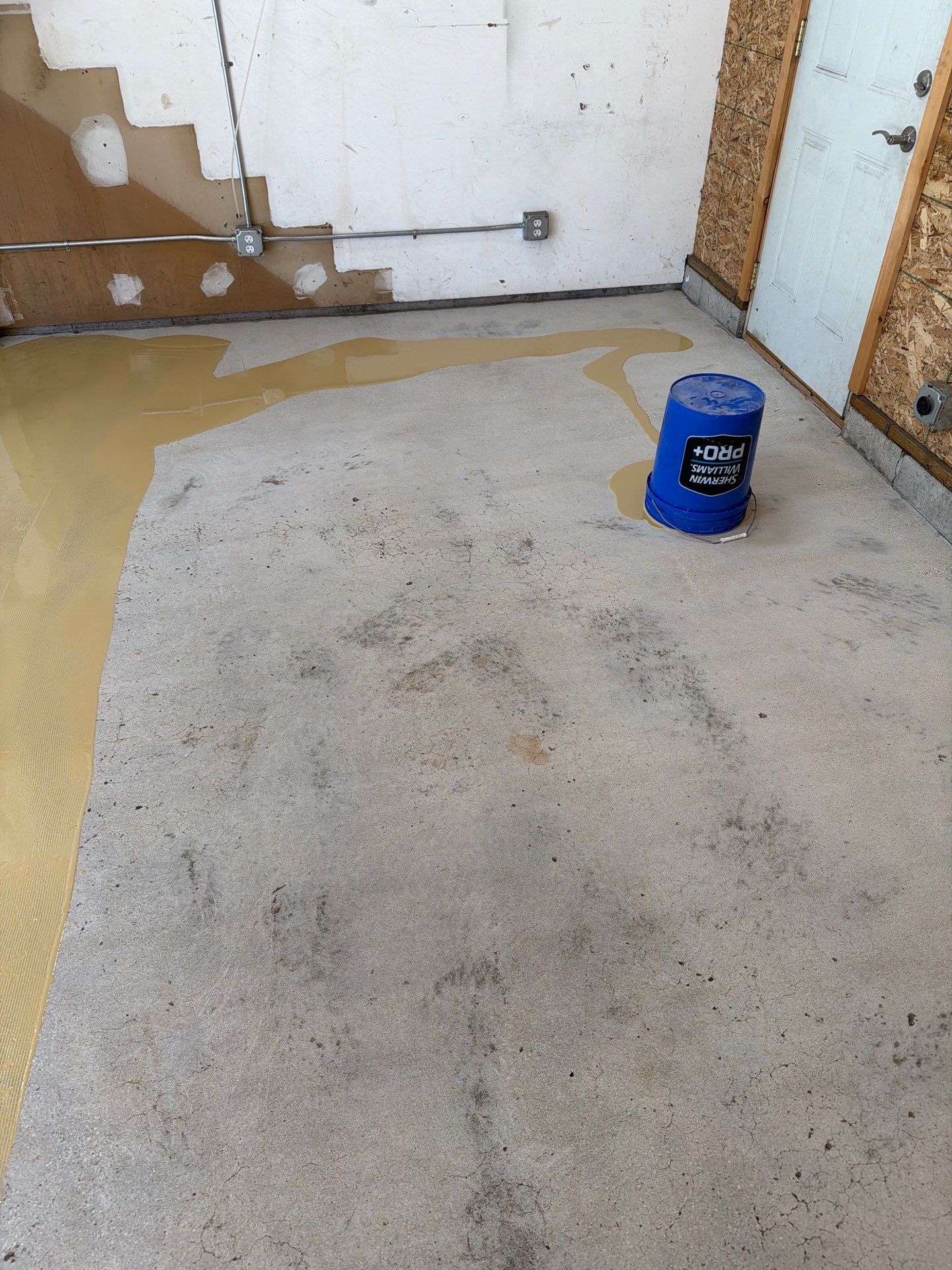 Custom Epoxy Garage Floor Completed In Norton Shores Michigan by Gordon Painting