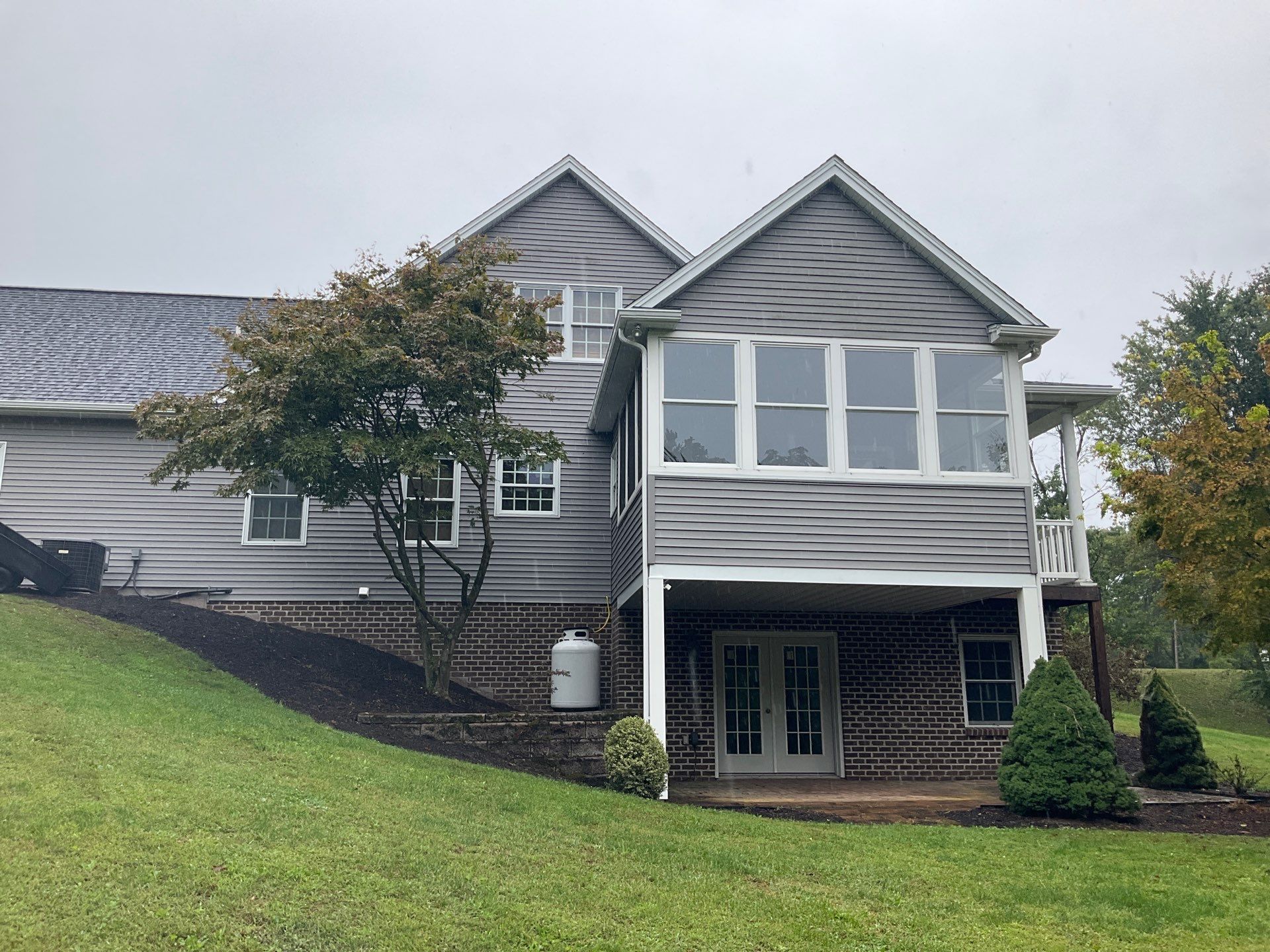 Full Vinyl Siding Replacement and Shingle Roof Install in Millersburg by Esh Builders