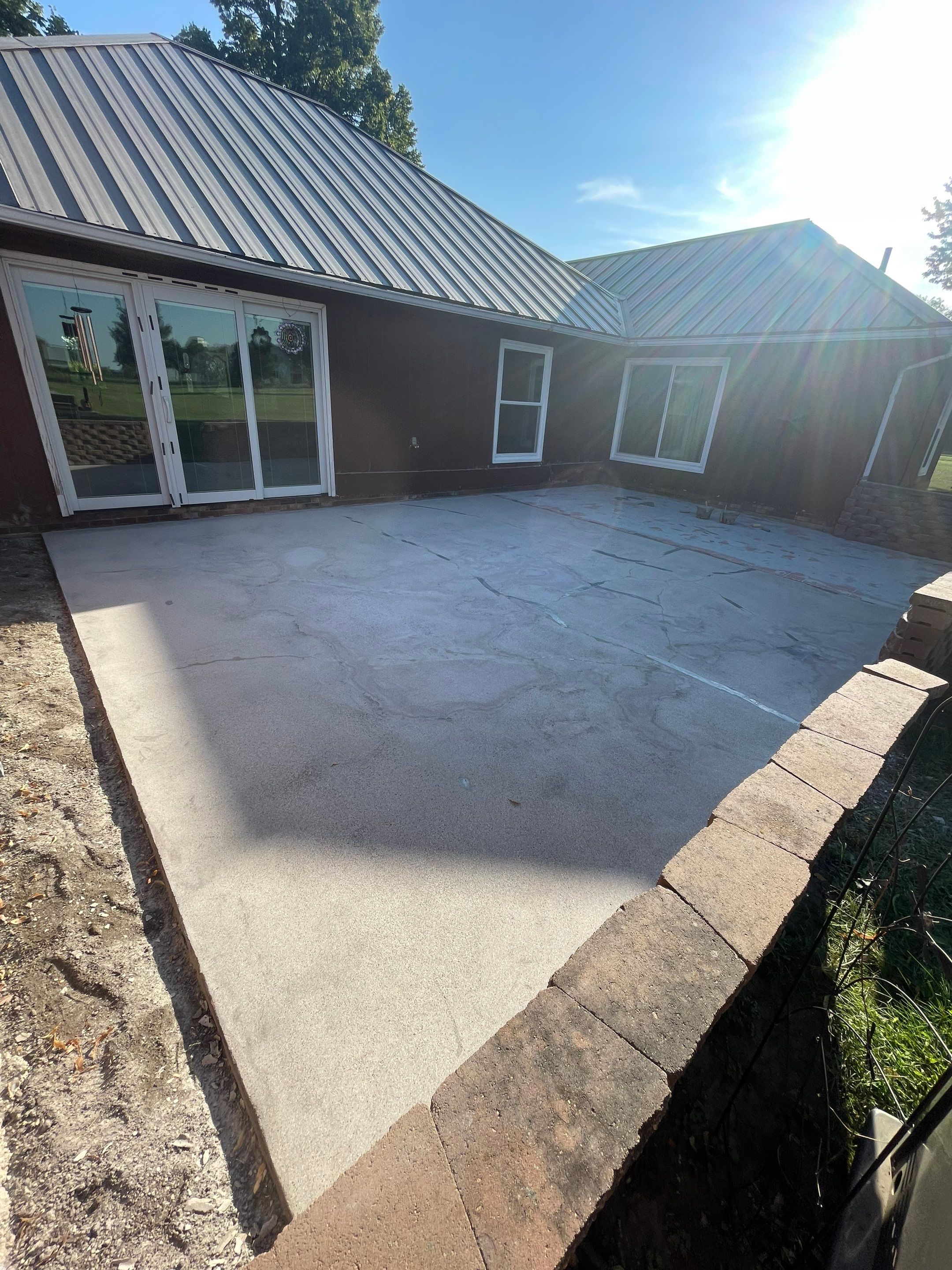 Concrete Patio Resurfacing and Protective Coating in Winfred, South Dakota by Select Painting, Coatings & Garage Cabinets