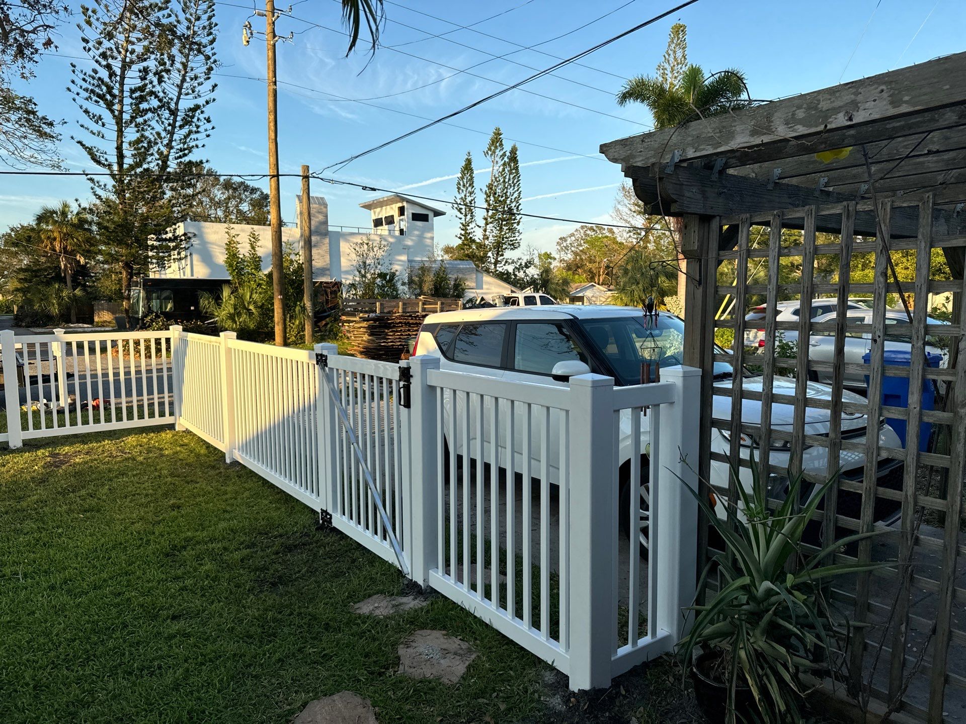 Vinyl Fence Installation using 6Ft White Vinyl Privacy Fence and a 4Ft White Vinyl Picket Fence by Asap fence and gates, LLC