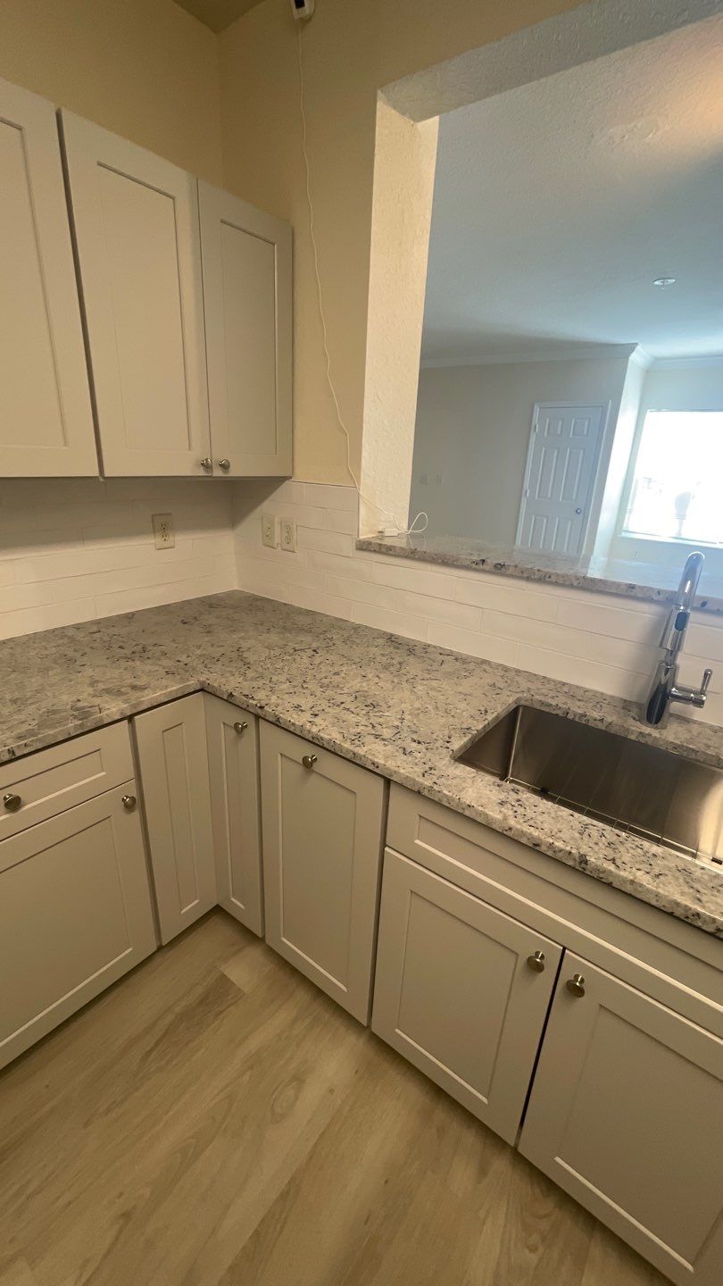 Home Remodel using LVP Flooring and Cabinets by HandyMangum