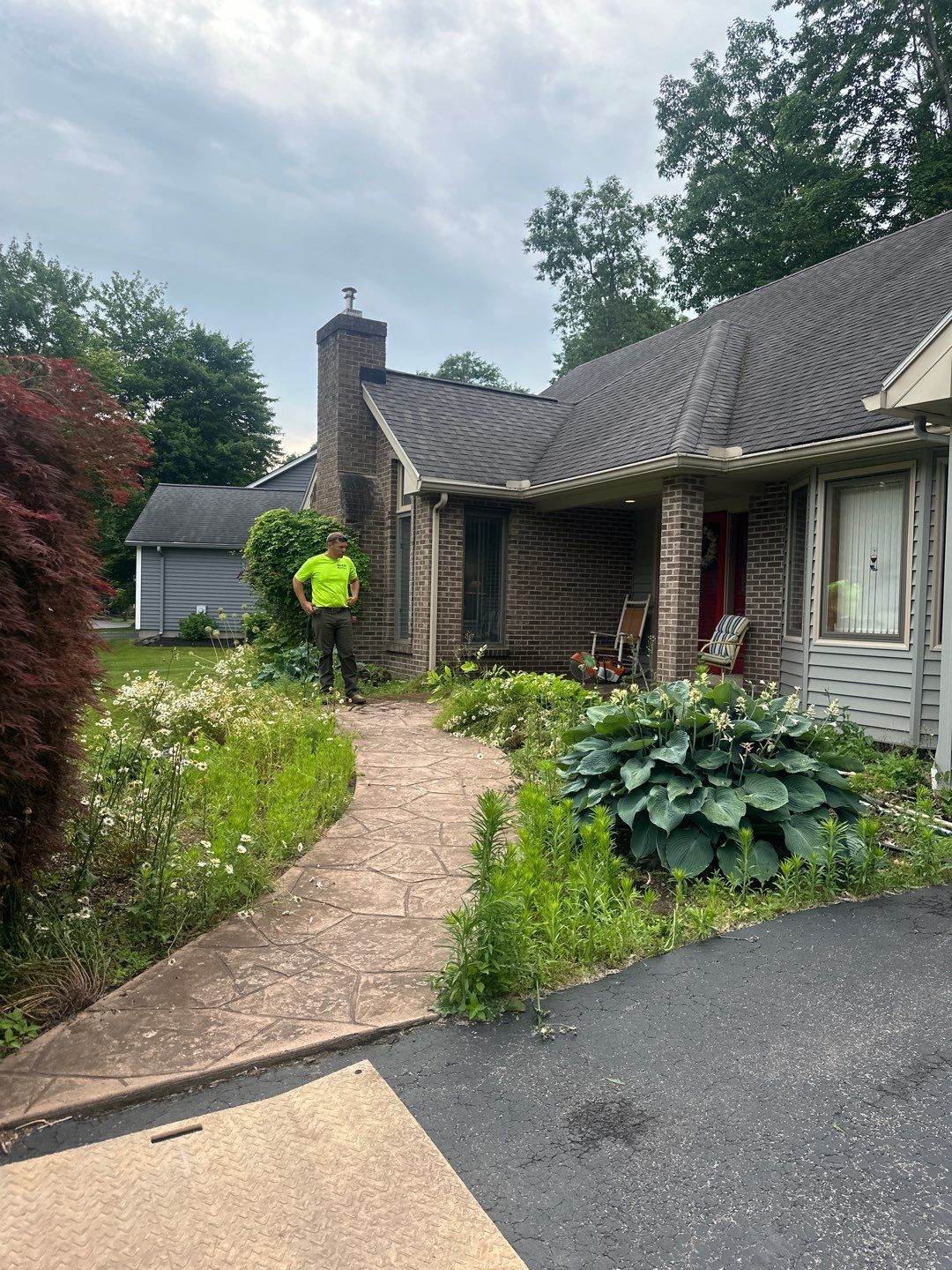 Heavy stone textured stamped concrete patio  by NG Masonry & Construction LLC