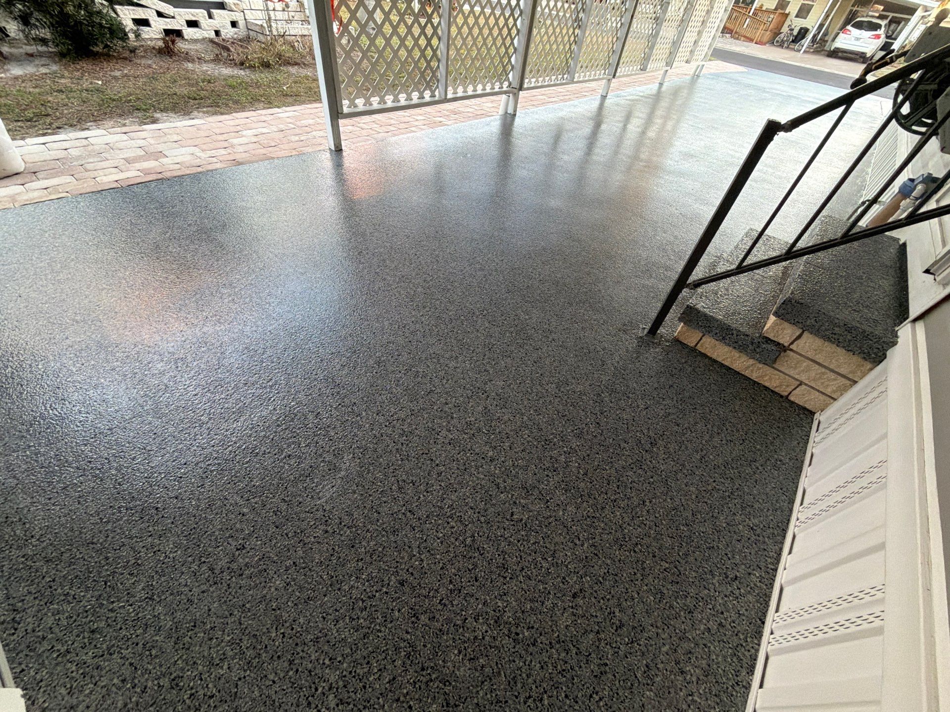 Driveway Transformation: Nightfall Flake System with Full UV & Moisture Protection by Performance Floors & Coating