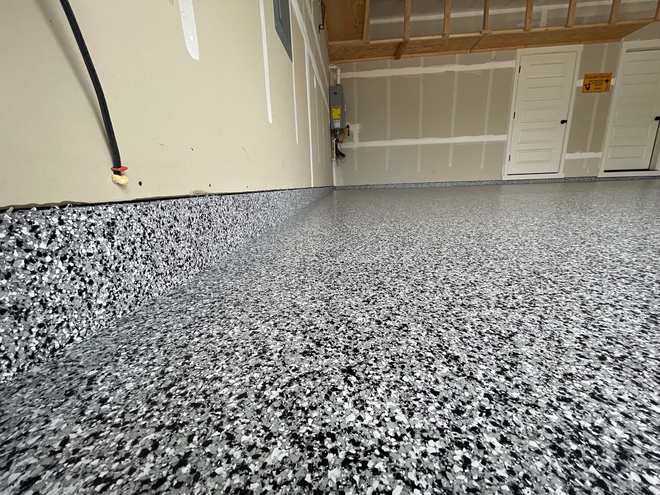 Garage Transformation using Domino by Croc Coatings, LLC