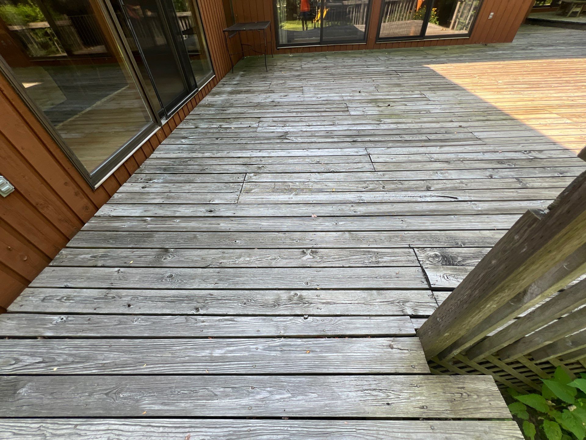 Deck, Patio, and Tennis Court Cleaning by Northern Power Washing LLC.