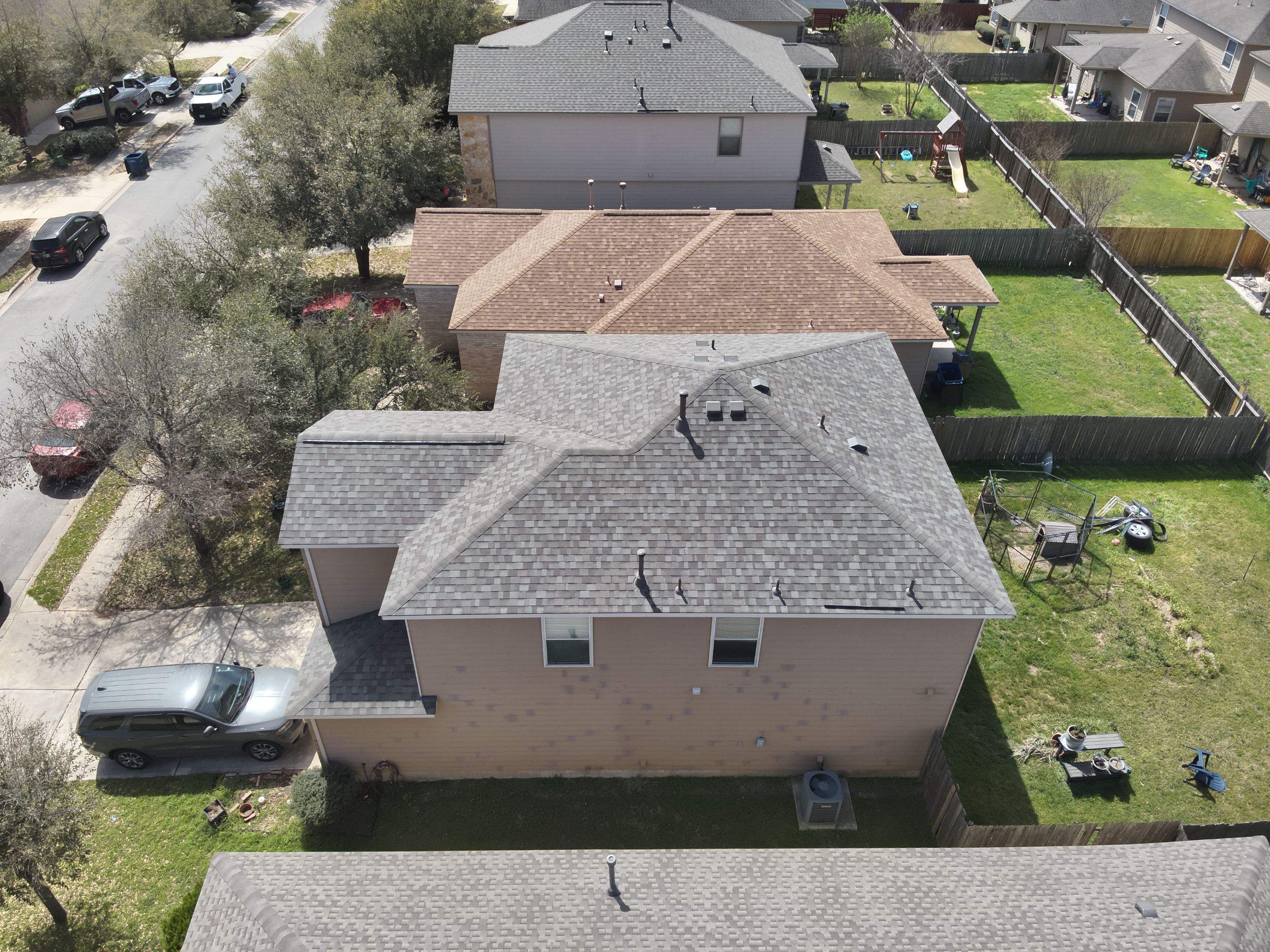 Residential Roof Replacement using Owens Corning - Duration - Driftwood by Action Exteriors Austin