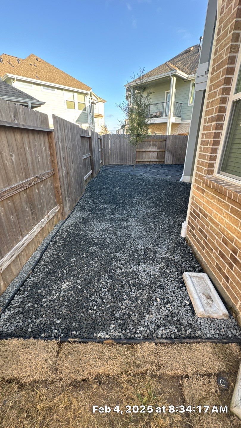 🌿💧 Mary Anne’s Backyard Upgrade – Drainage & Gravel Solution  Every great outdoor space starts with a strong foundation—and for Mary Anne, that meant tackling her backyard drainage challenges first.  Our team stepped in to improve the current drainage system, ensuring stormwater flows naturally away from the foundation. This not only protects the property but also sets the stage for a long-lasting, low-maintenance backyard.  Once the flow was under control, we moved on to creating a new gravel area, complete with fresh leveling, grading, and compaction. By combining proper drainage with durable materials, we built a space that’s as functional as it is clean and polished.  🛠 Project Highlights  Drainage Improvements – installed PVC system to redirect water and prevent pooling.  Gravel Installation – black star gravel compacted over weed blocker for strength and beauty.  Paver Additions – functional stepping areas designed for both style and convenience.  Material Upgrades – premium weed blocker, bend-a-board edging, and drainage stacks.  ✅ Result: Mary Anne now enjoys a backyard that is secure, low-maintenance, and ready for future features like a fire pit or expanded patio.  💡 At Texas Urban Elements, Alejandro and his team of handcrafted specialists focus on long-term solutions—blending design, drainage, and durability into every project.  📢 Ready to protect your home while upgrading your outdoor space? Let’s design your solution today. by Texas Urban Elements