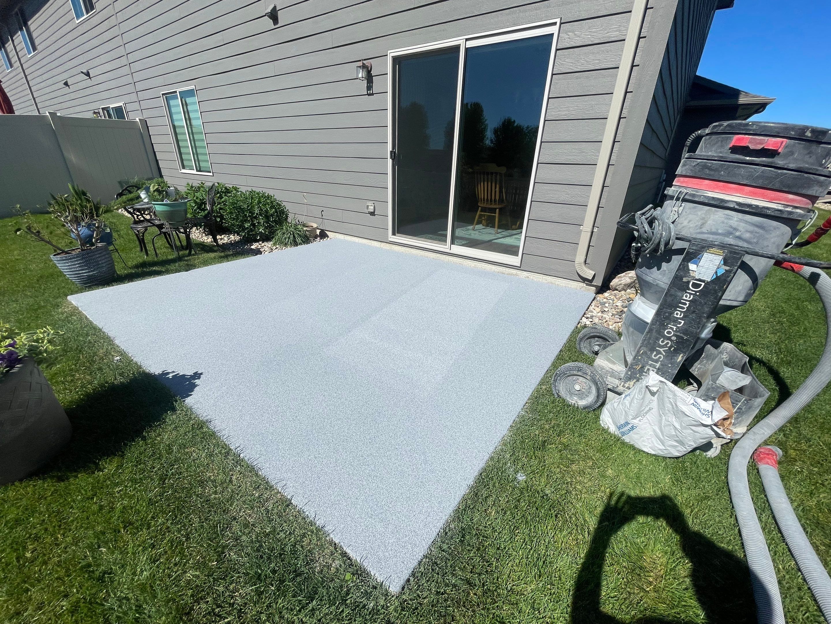 Custom Concrete Coating for Sioux Falls Patio and Front Walkway by Select Painting, Coatings & Garage Cabinets