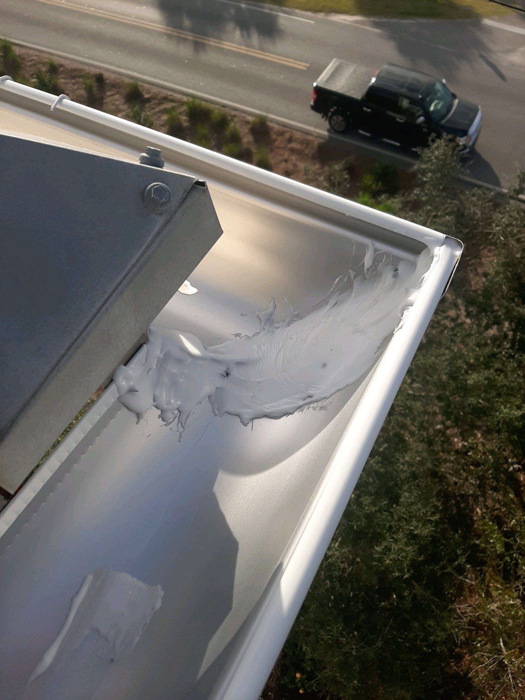 Gutter Installation Using White 6 Inch Seamless Gutters by Gutter Professors
