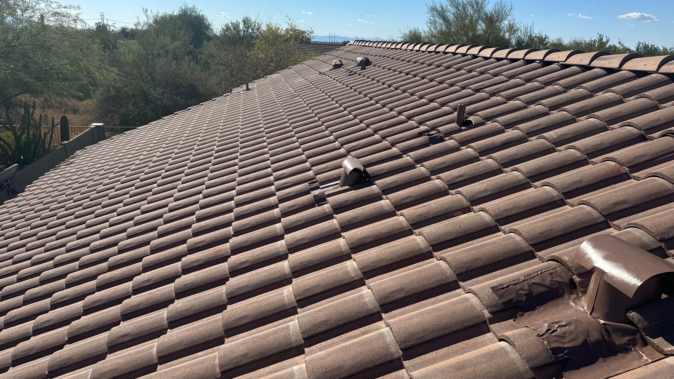 Residential Roofing Installation using Clay Tile by Weather-Tite Exteriors LLC