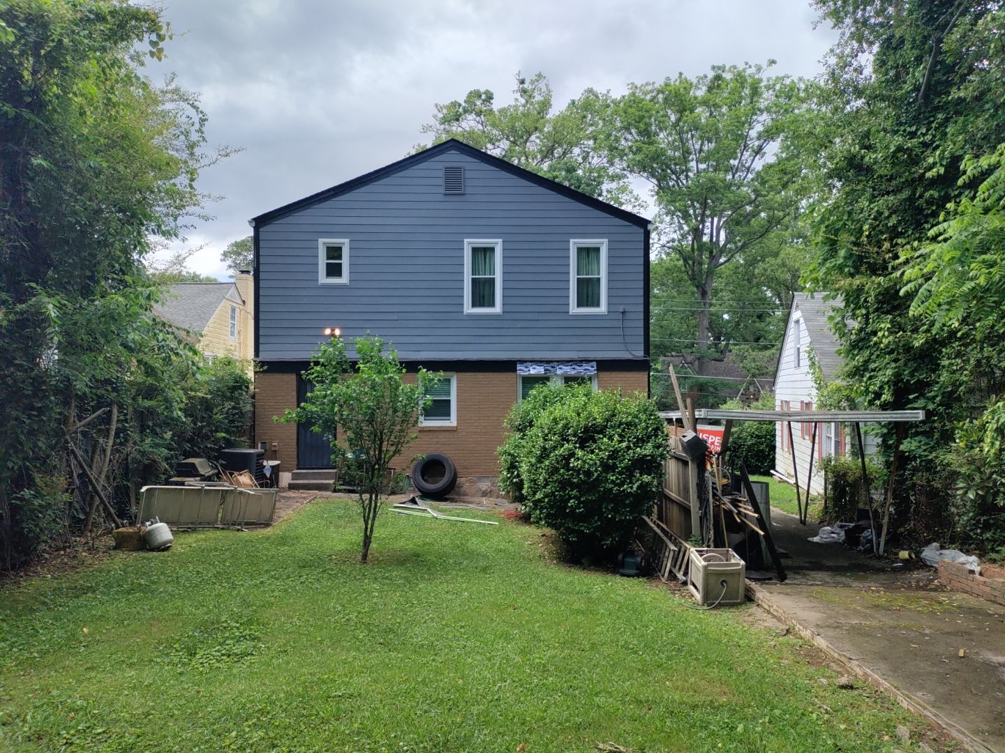 Residential Roof Replacement using Owens Corning Trudef Twilight Black by Inspector Roofing and Restoration
