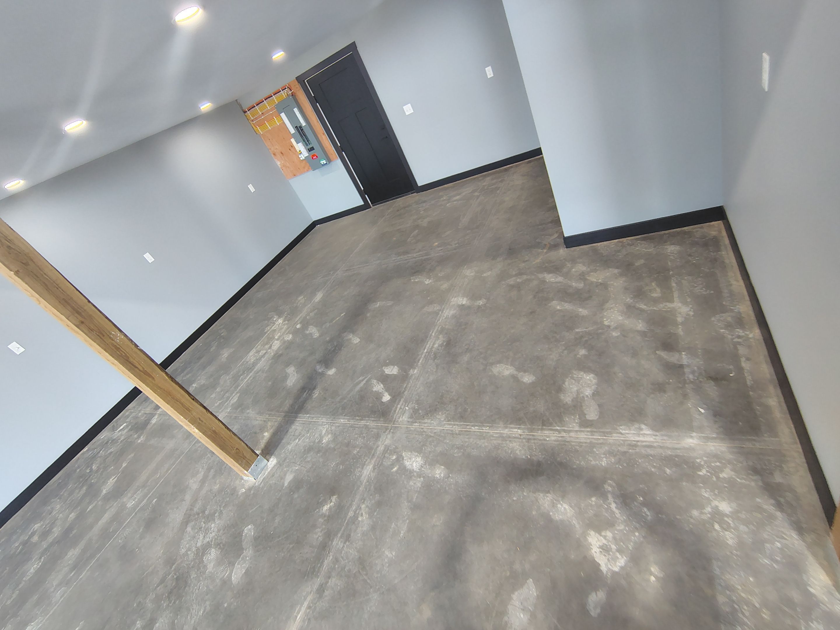 Polyaspartic Garage Floor Coating with Decorative Flake in Wentworth by Select Painting, Coatings & Garage Cabinets
