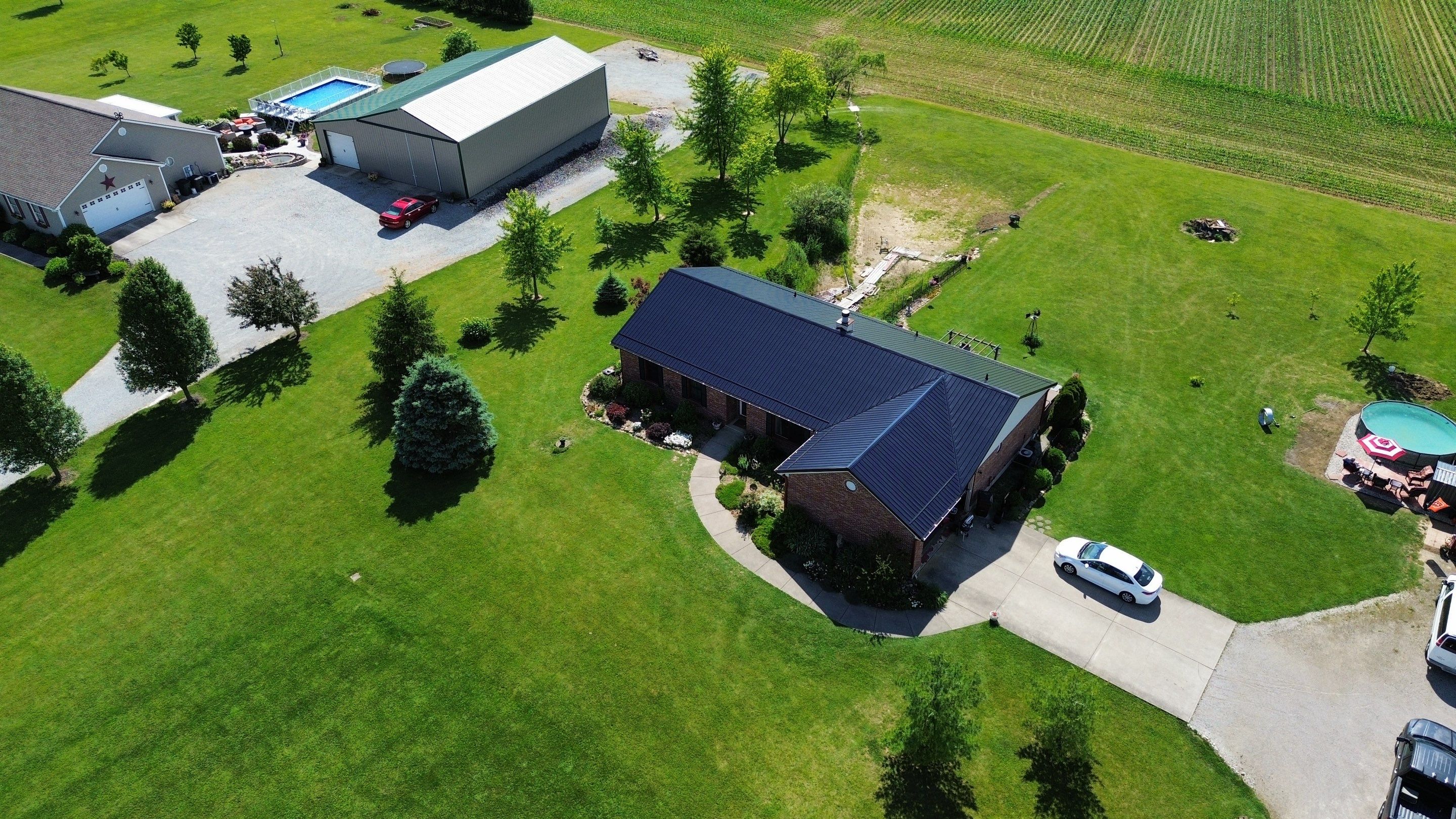 Residential Roofing Installation using Perfromance Panel Metal - Black by RoofX 