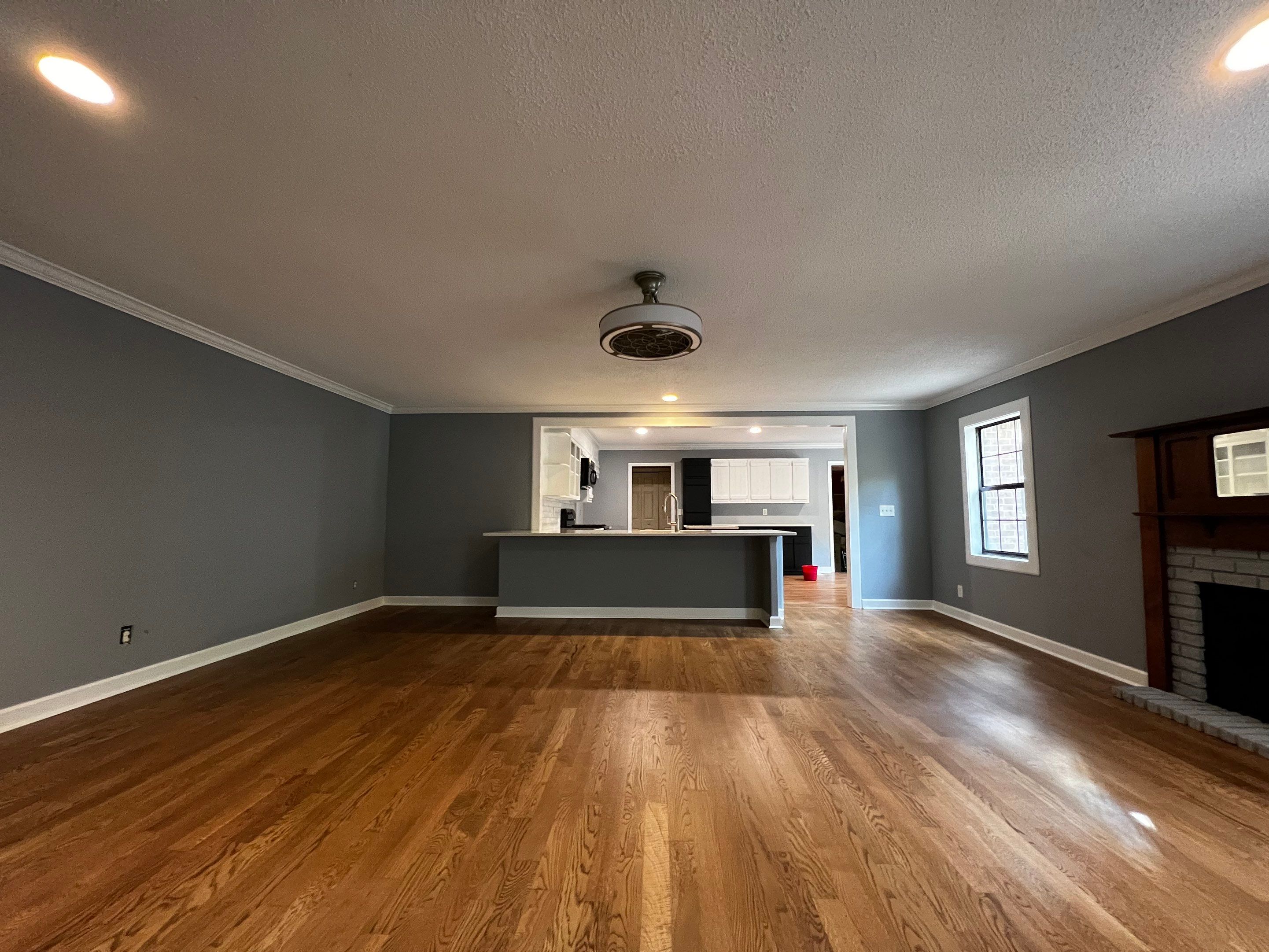 Kitchen and Living Area Renovation Featuring Hardwood Flooring in Smyrna by Swift Home Renovations