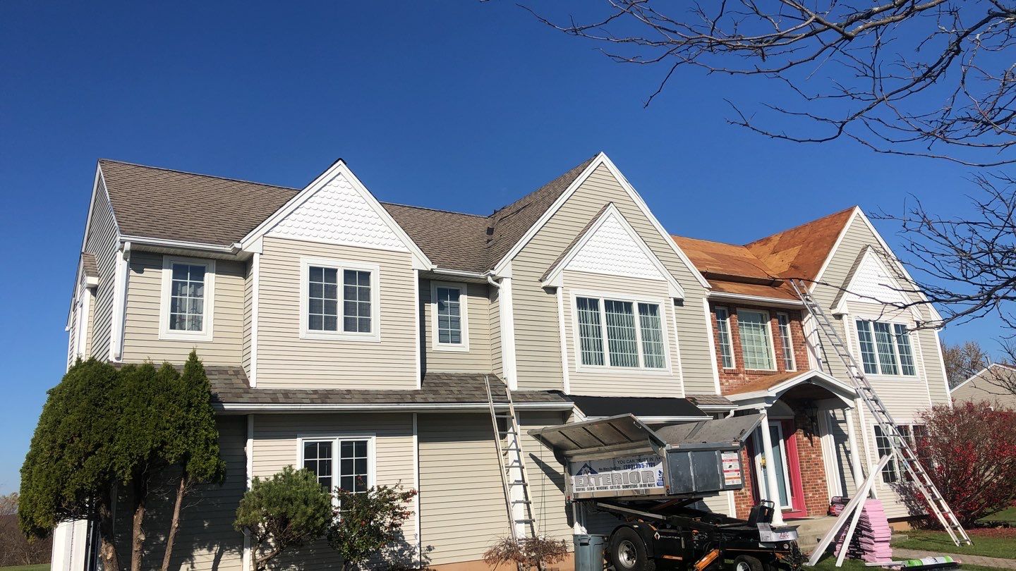 Commercial Roofing Installation using Owens Corning TruDefinition driftwood by A Plus Exterior