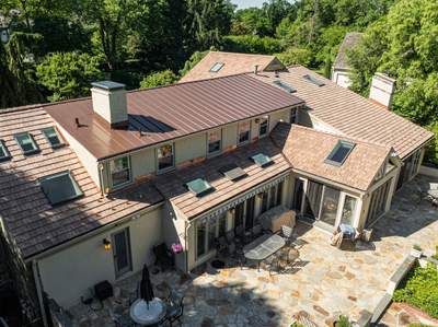 Cedar Roof Replacement with Standing Seam Copper Roof